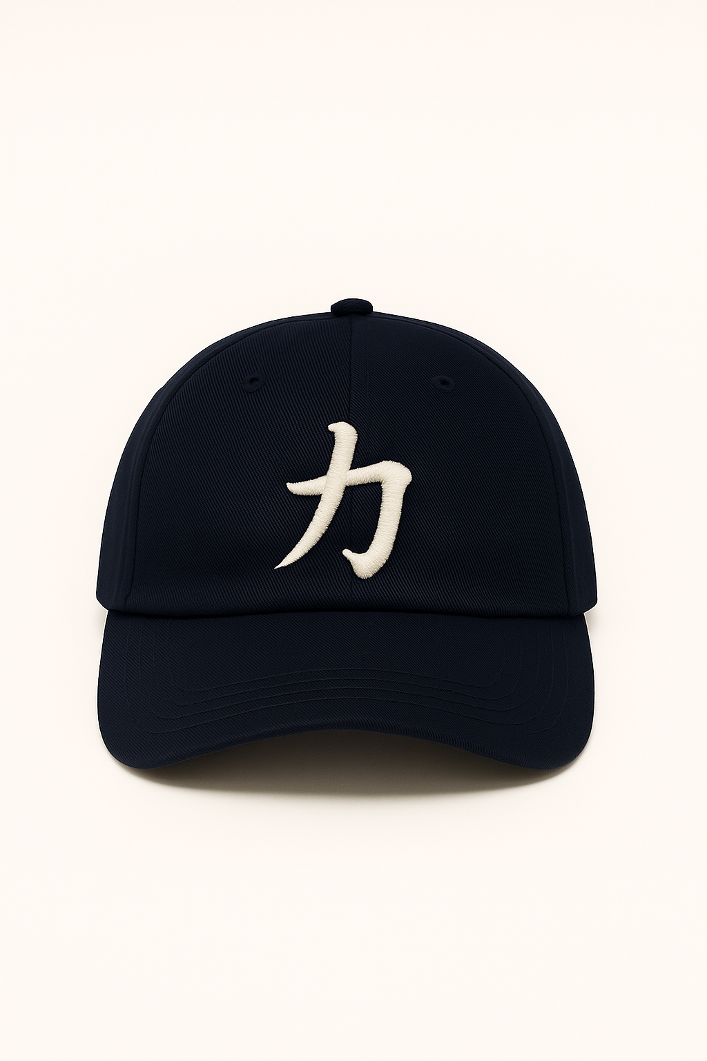 Navy Osaka baseball cap with embroidered white 力 (Strength) kanji on a beige background