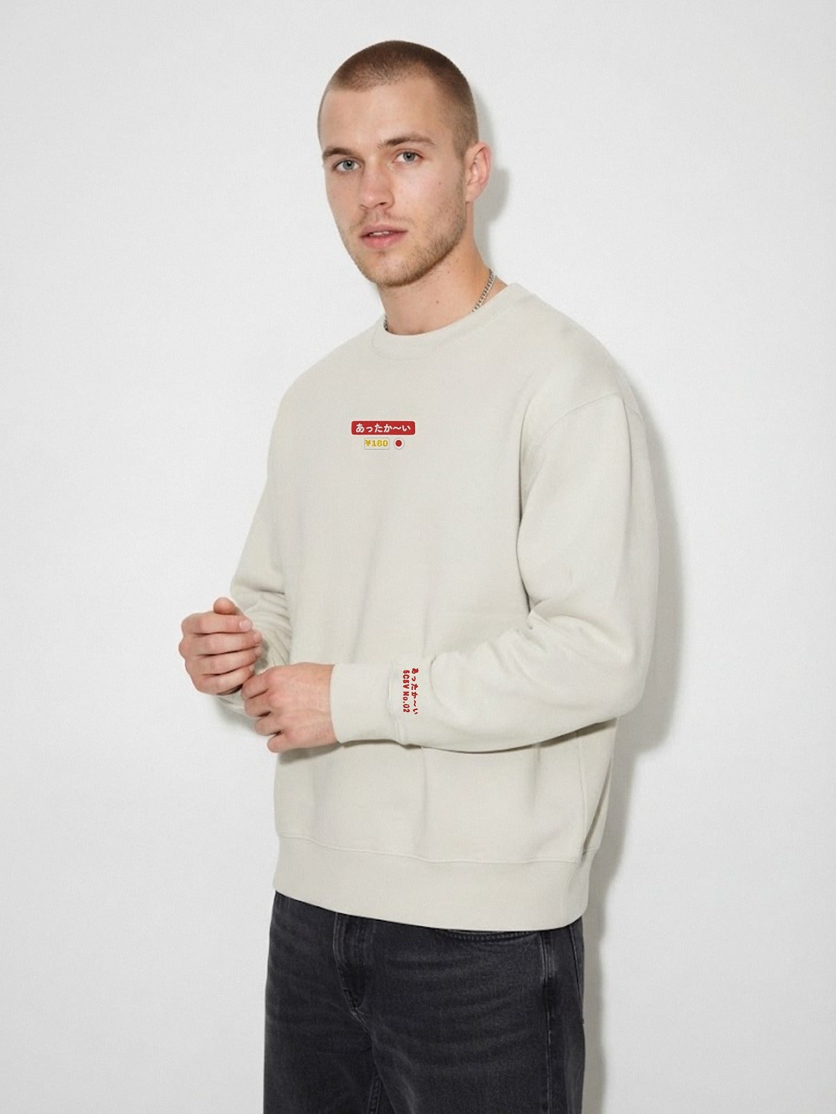 Model wearing the 5C5V Attaka-i あったか〜い heavyweight crewneck in Lunar Rock, あったか〜い 5C5V No.02 embroidered on the left cuff