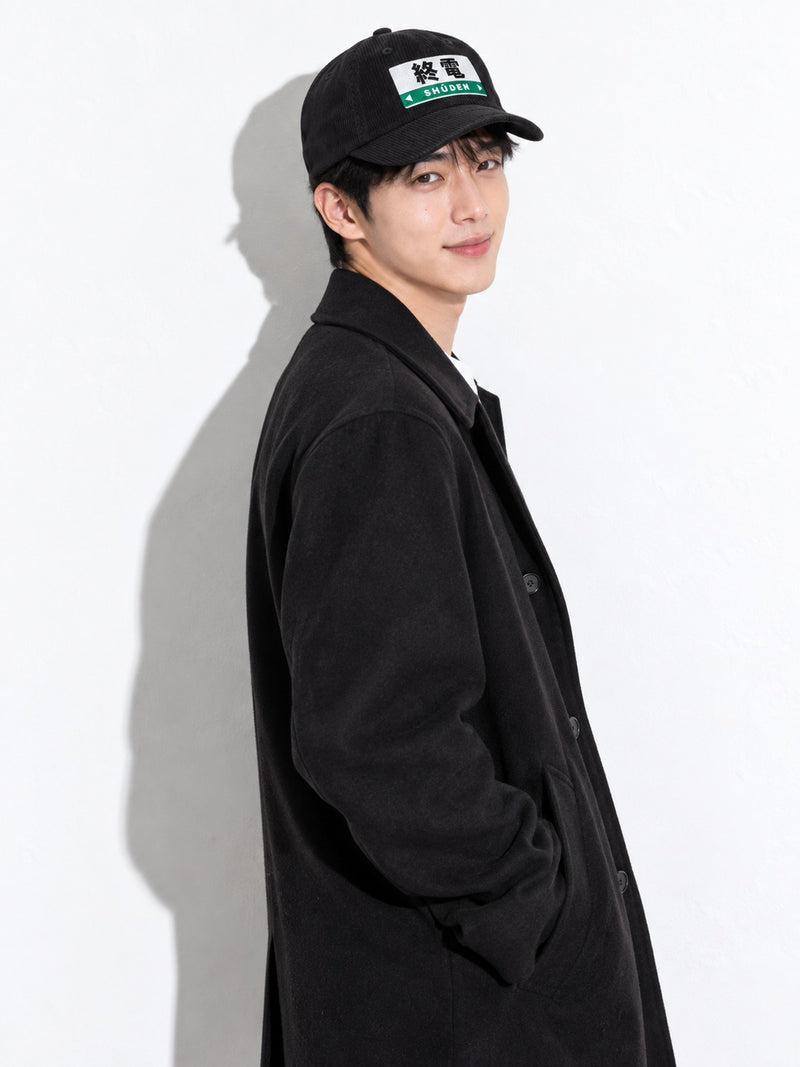 Shūden corduroy cap, black, over-the-shoulder