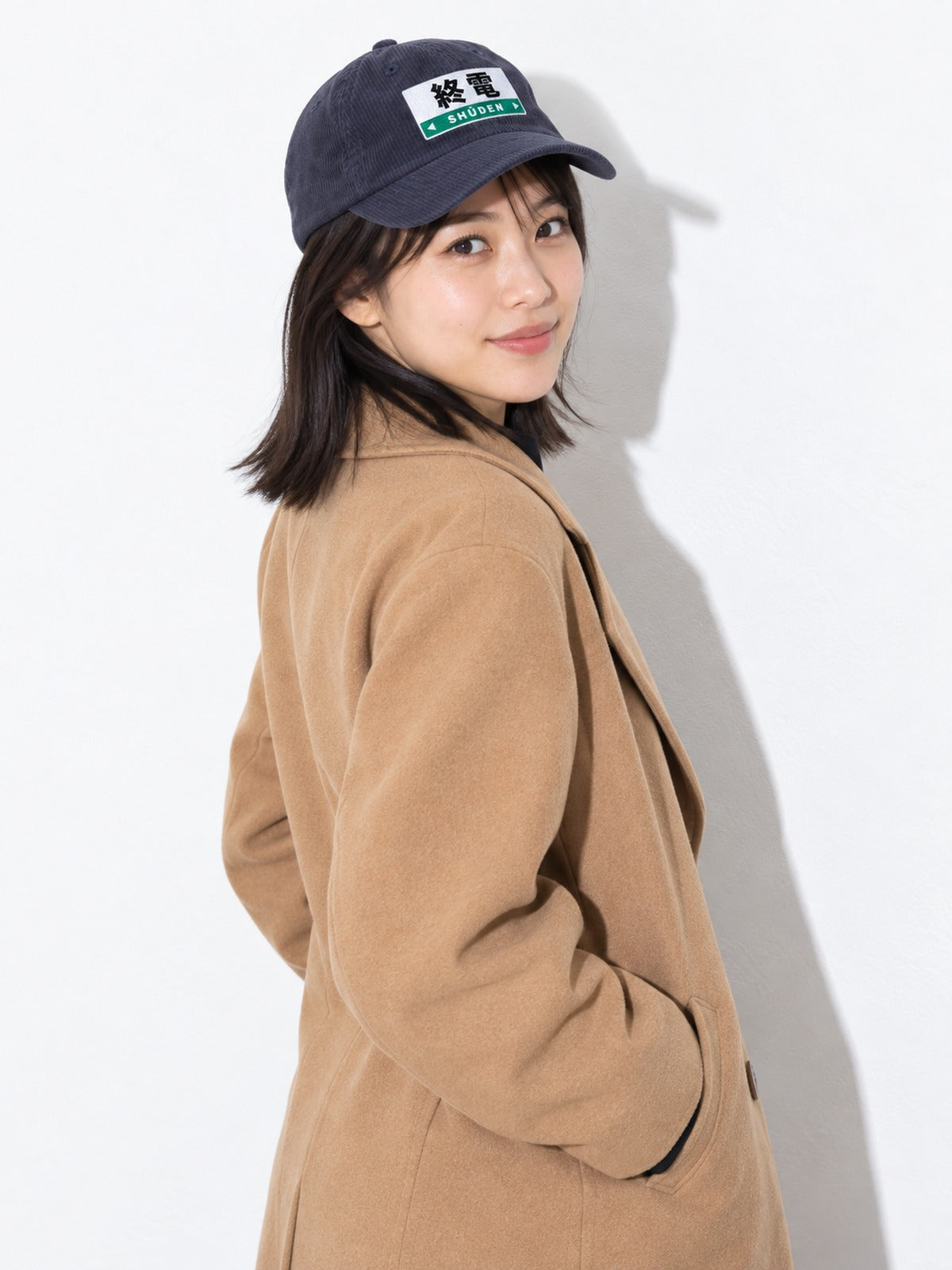 Shūden corduroy cap, navy, over-the-shoulder