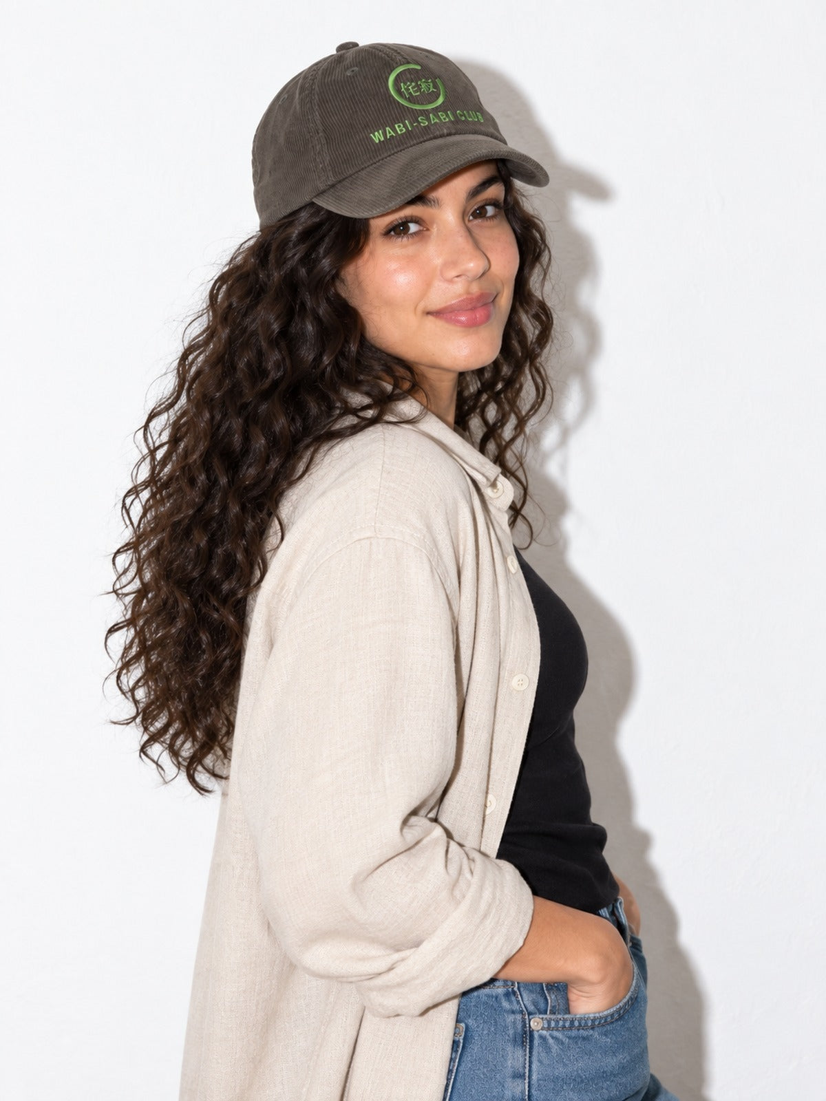 Wabi-Sabi Club corduroy cap, olive, over-the-shoulder