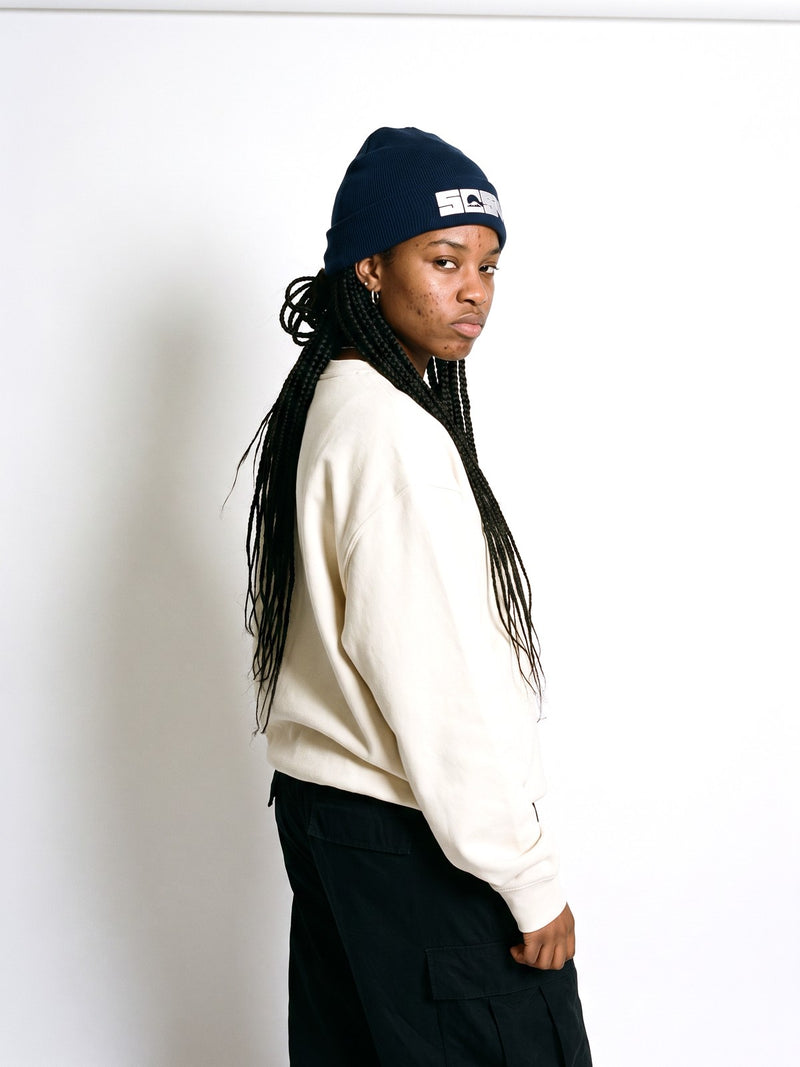 5C5V Originals Japanese beanie in navy with the white embroidered 5C5V Mt Fuji logo, worn on a white background