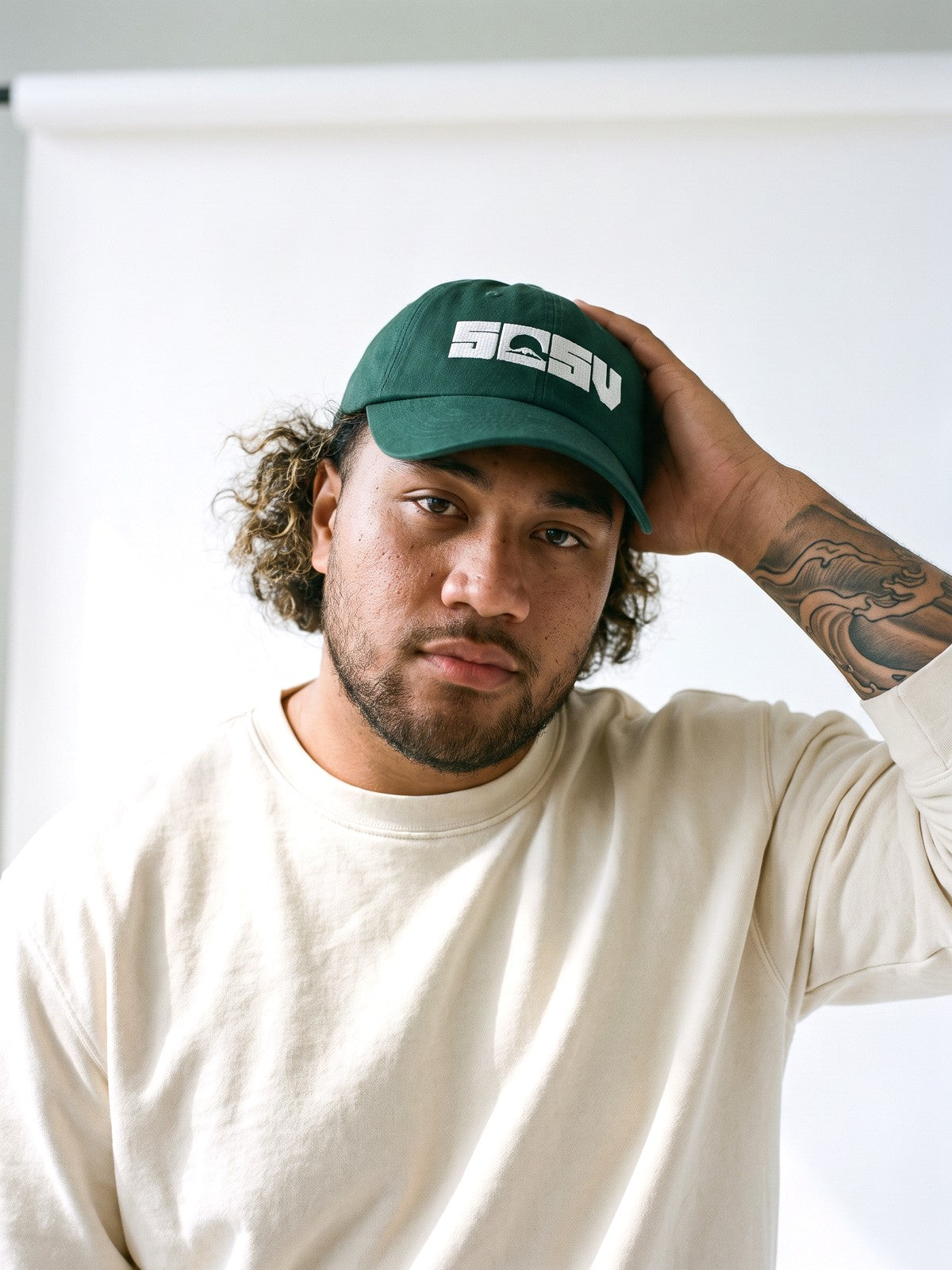 5C5V Originals Japanese baseball cap in spruce green with the white embroidered 5C5V Mt Fuji logo, worn on a white background