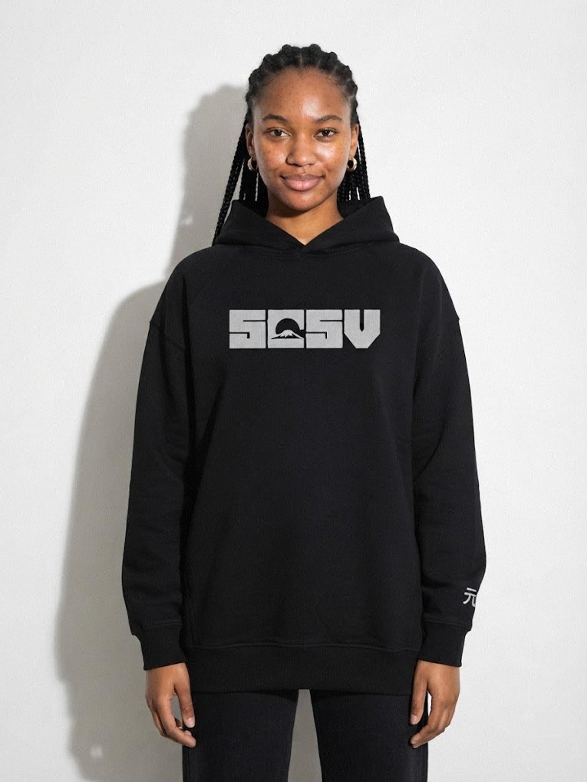 Model wearing the 5C5V Originals 元 heavyweight hoodie in black, Mt Fuji 5C5V logo embroidered across the chest in light grey