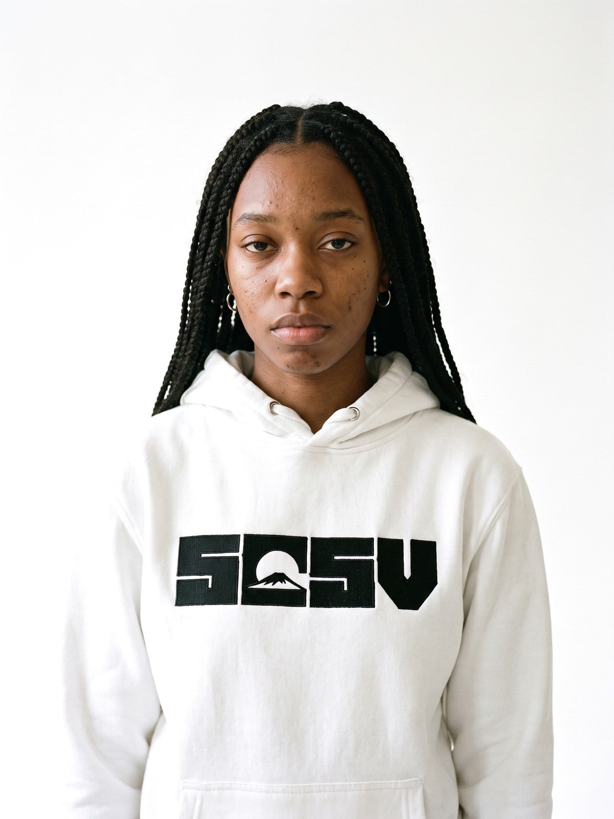 5C5V Originals hoodie in white, worn on a white background