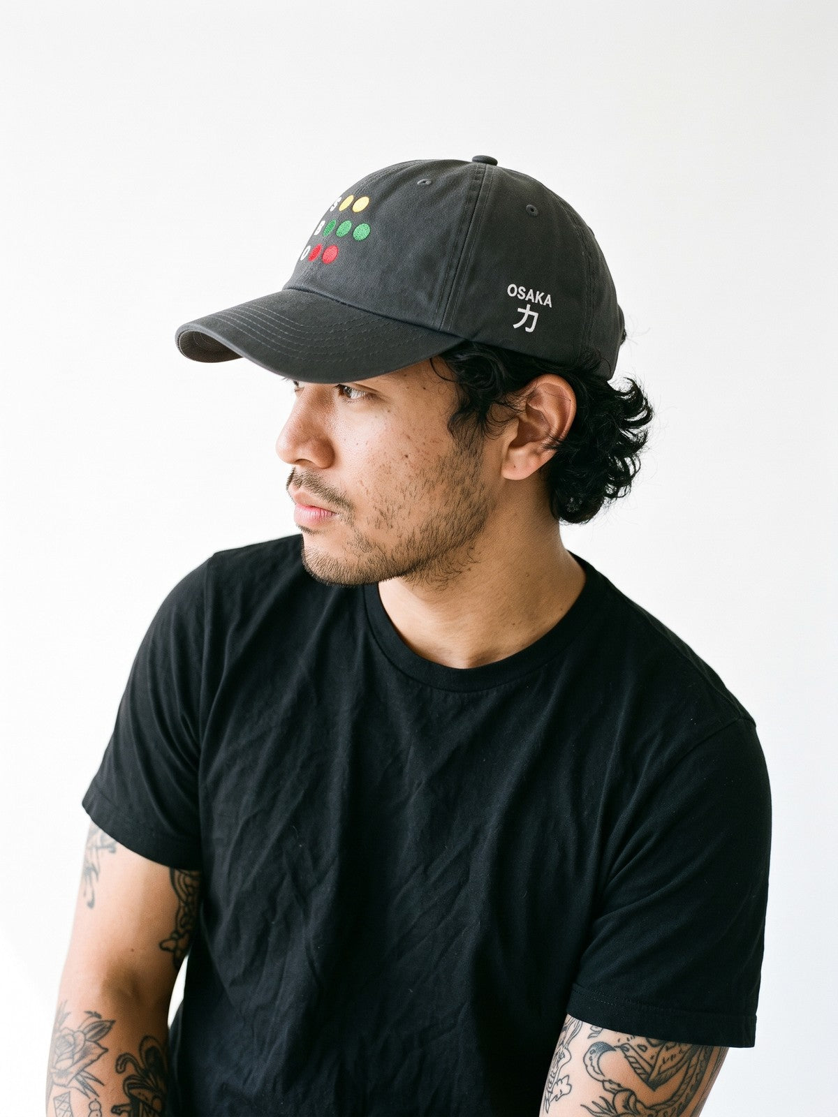 Side view of the 5C5V Osaka Full Count Japanese baseball cap in dark grey, OSAKA above 力 (strength) embroidered on the left side