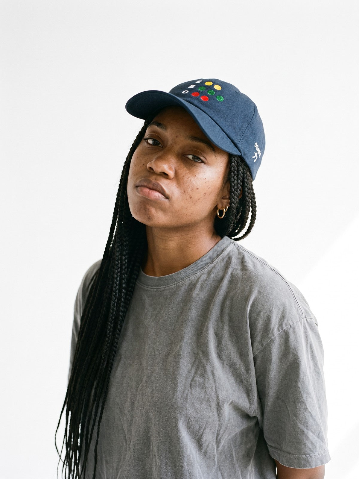 Model wearing the 5C5V Osaka Full Count Japanese baseball cap in navy, the old S-B-O count board embroidered on the front, OSAKA and 力 (strength) on the left side
