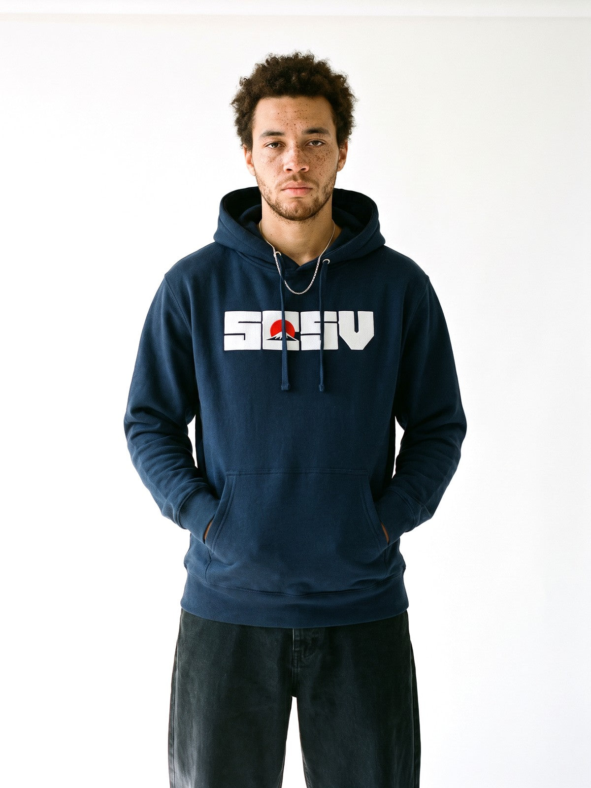 5C5V Red Sun hoodie in navy, worn on a white background