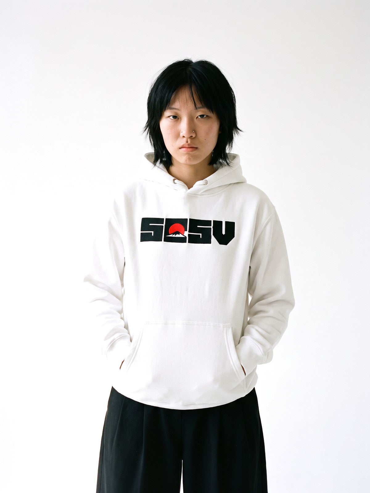 5C5V Red Sun hoodie in white, worn on a white background