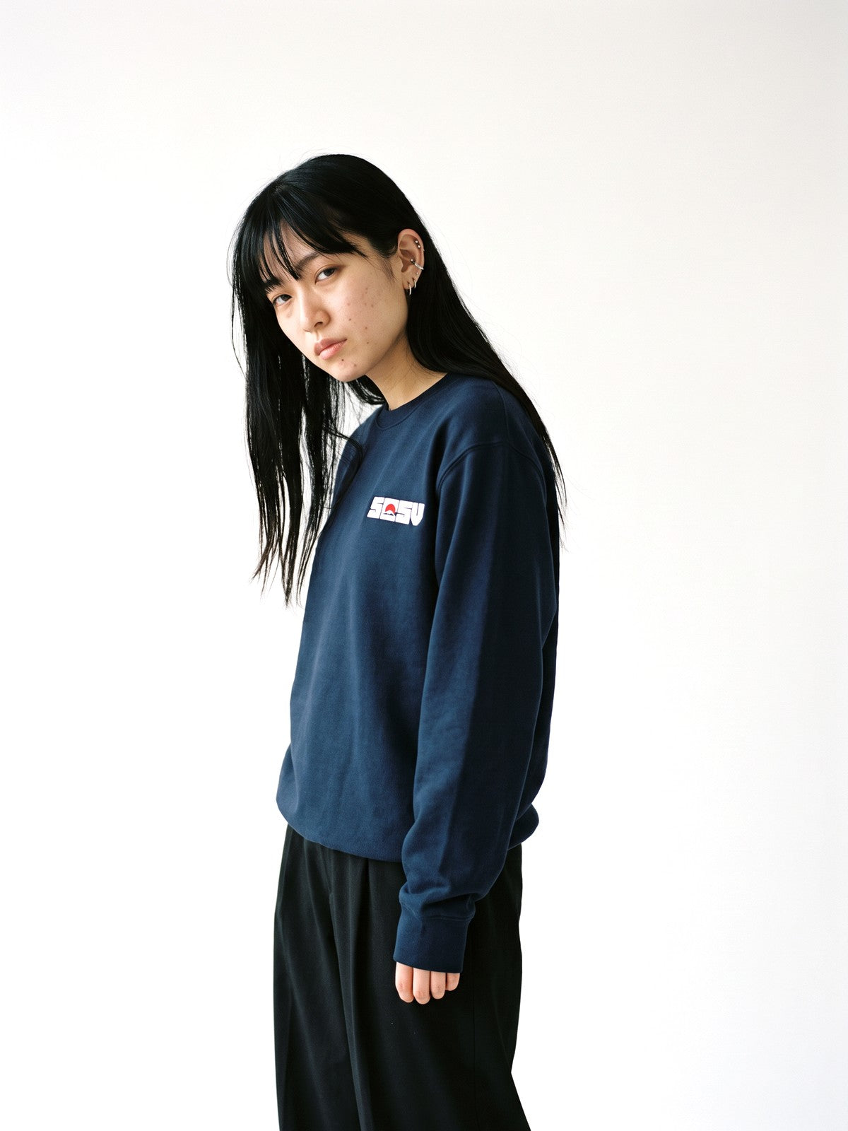 5C5V Red Sun sweatshirt in navy, worn on a white background