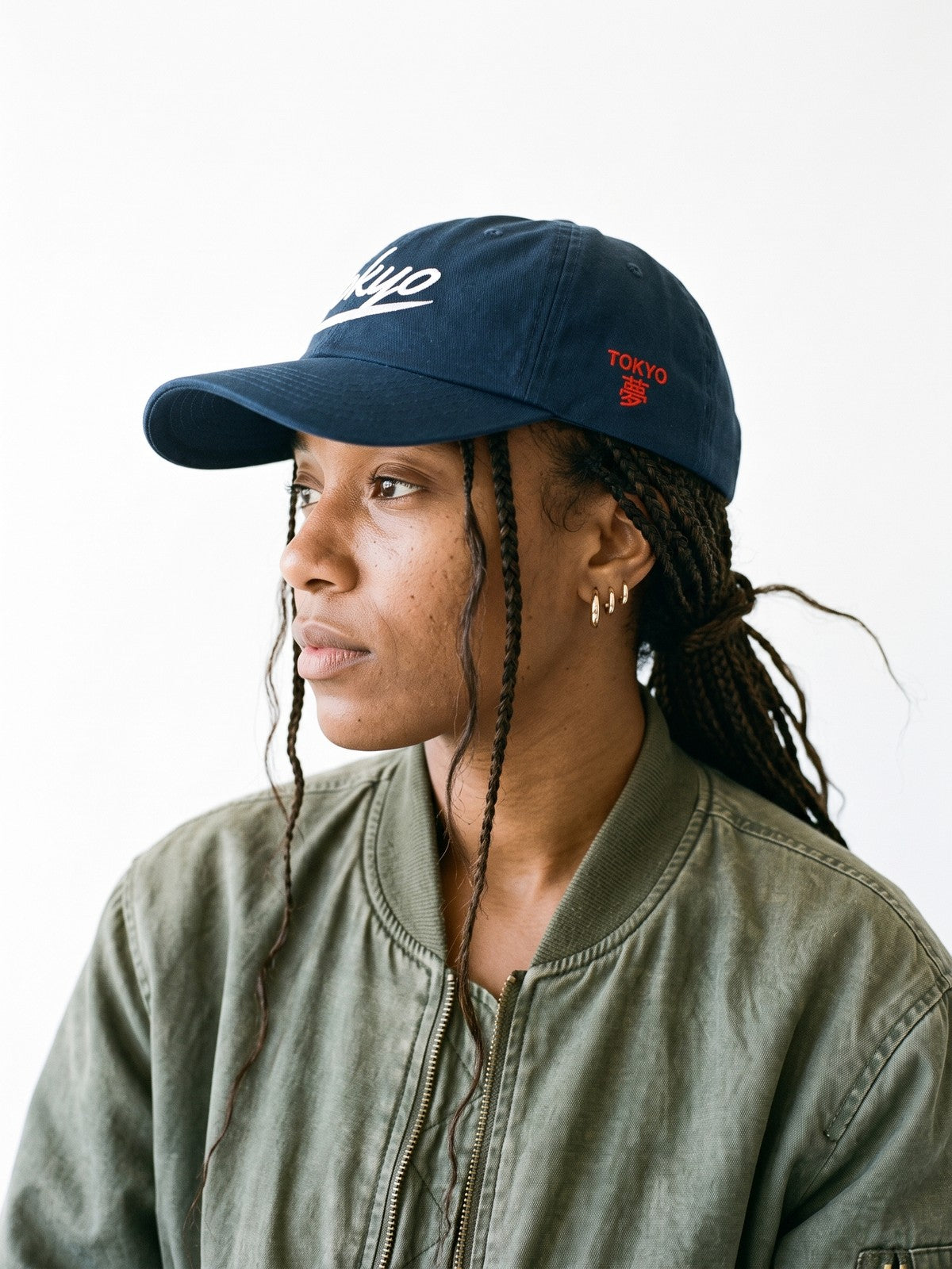 Side view of the 5C5V Tokyo Script Japanese baseball cap in navy, TOKYO above 夢 (dream) embroidered on the left side