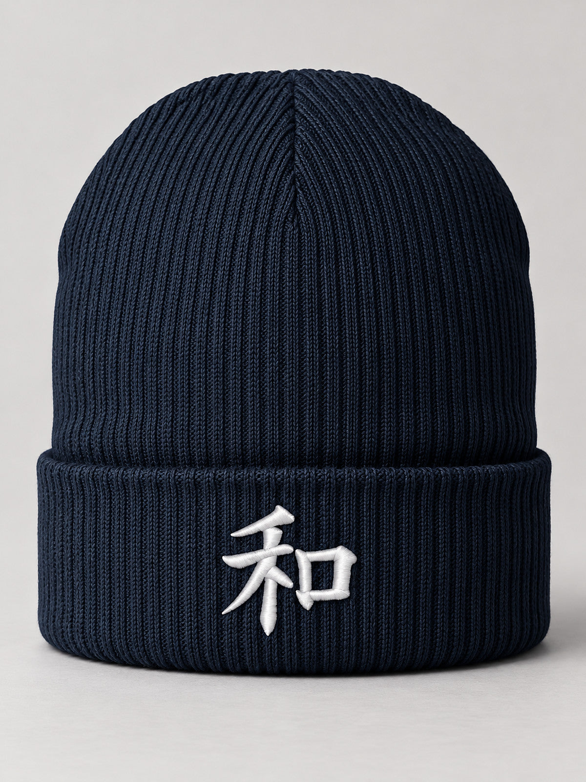 Oxford Navy Kyoto Harmony 和 ribbed beanie with the white 3D-puff 和 embroidered on the cuff, front view