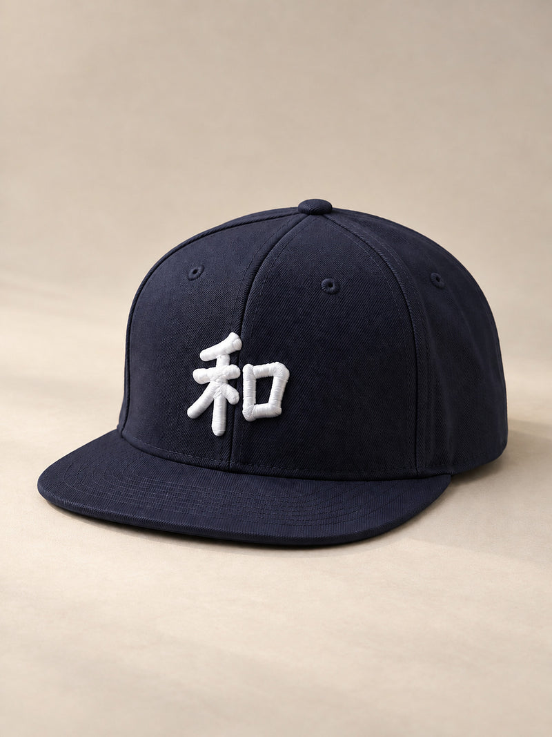 Navy Kyoto Harmony 和 Japanese Snapback, three-quarter view with the flat brim