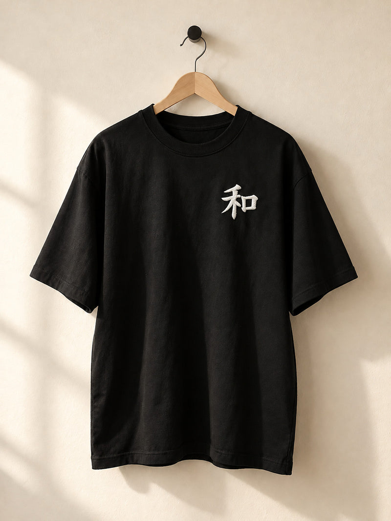 Black Kyoto Harmony 和 premium oversized tee on a wooden hanger