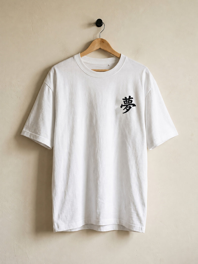 White Tokyo Dream 夢 premium oversized tee on a wooden hanger, front view