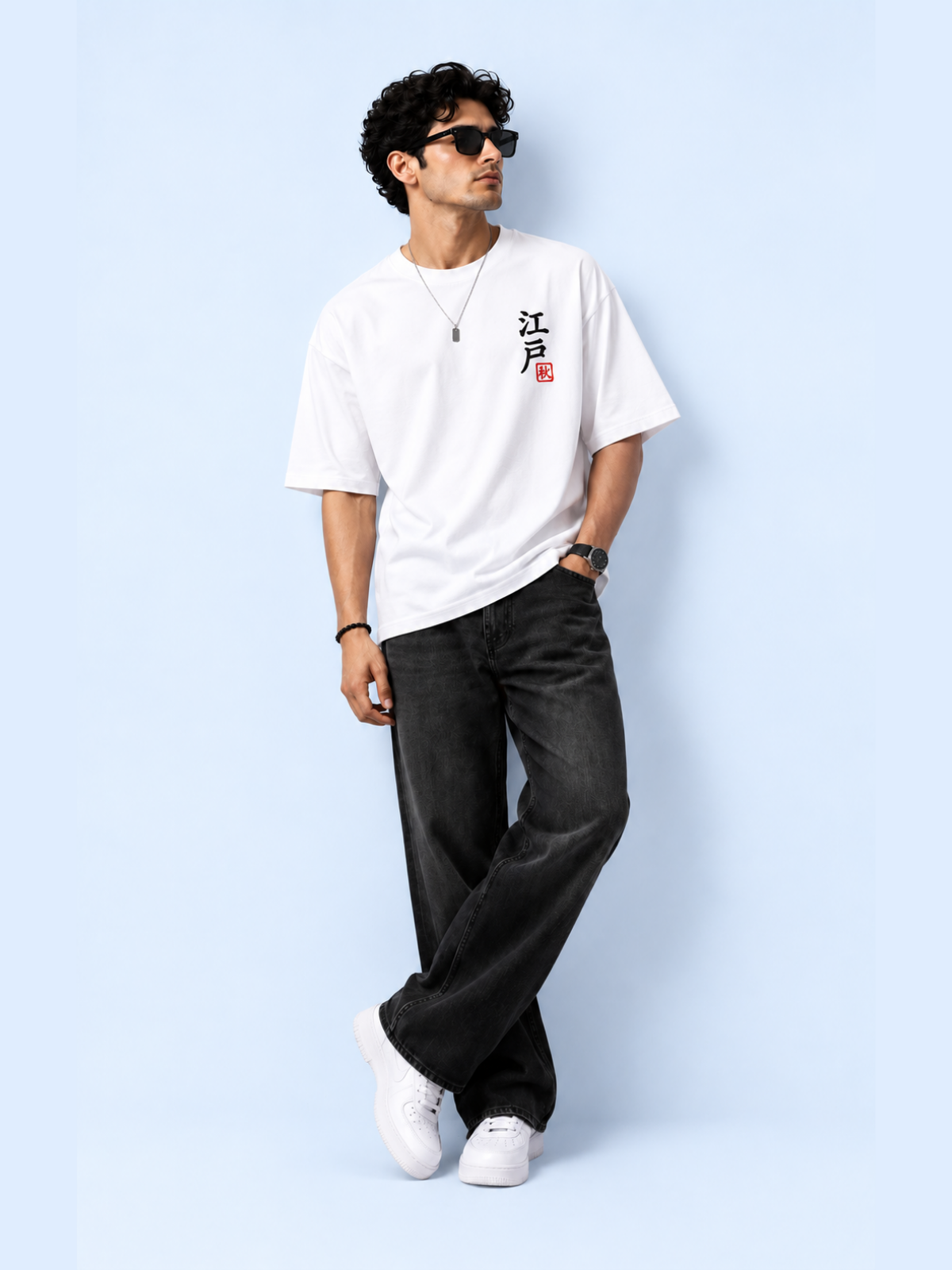 Full-length shot of a model in the white Edo 秋 Fading Ember tee
