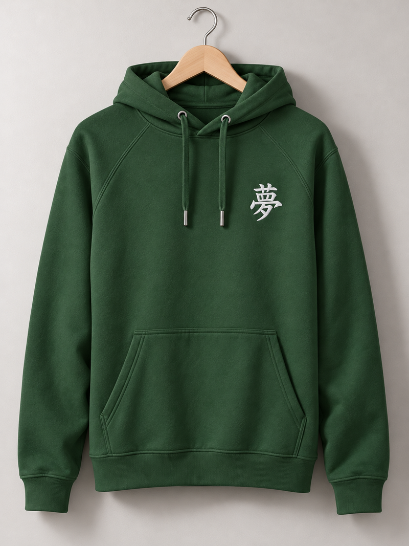 Bottle green Tokyo Dream 夢 hoodie on a wooden hanger, front view with the small white embroidered 夢 on the left chest