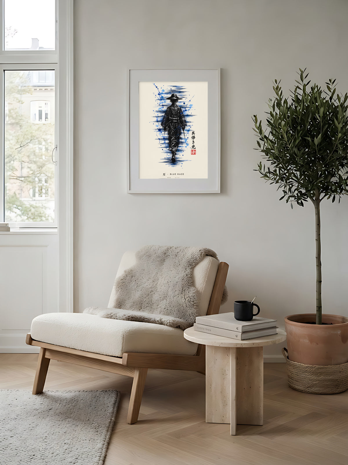 Edo Blue Haze 夏 framed print: a lone traveller in a straw hat in black ink with splashes of blue, white frame in a Scandi reading corner