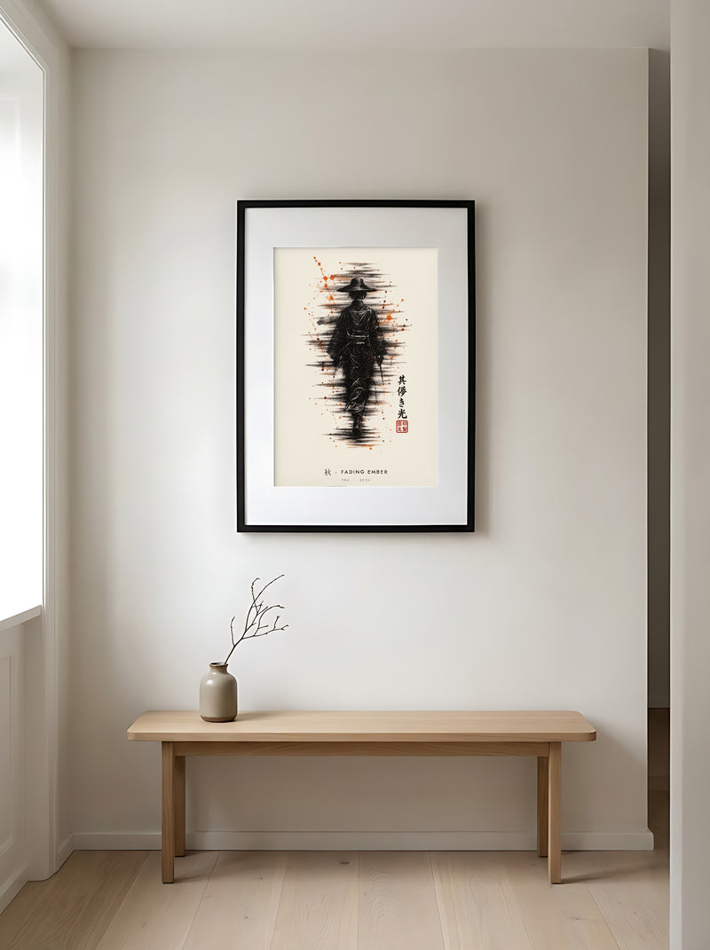 Edo Fading Ember 秋 framed print: a lone traveller in a straw hat in black ink with rising orange sparks, black frame in a Japandi entryway above an oak bench