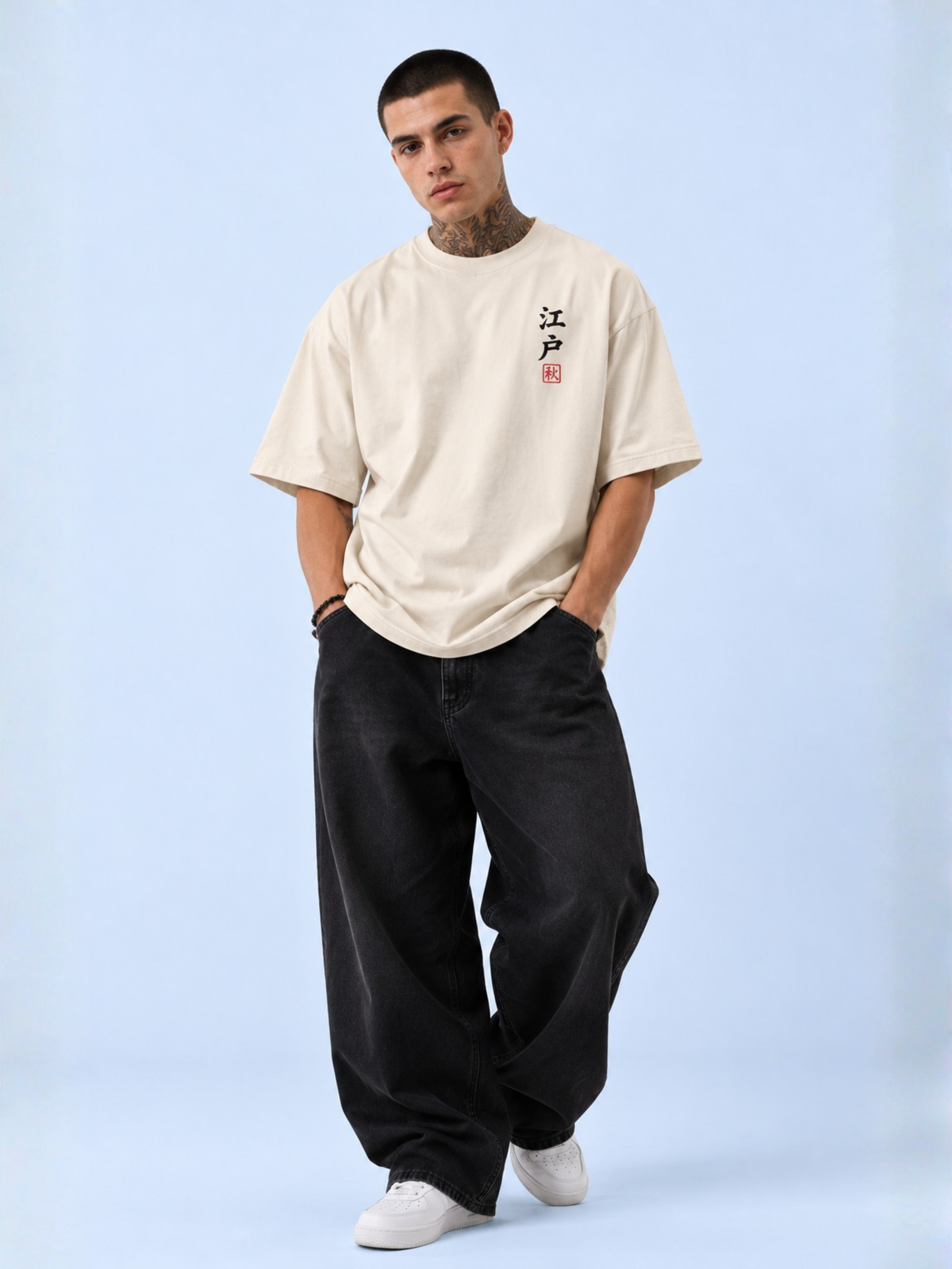Full-length shot of a model in the vintage white Edo 秋 Fading Ember tee