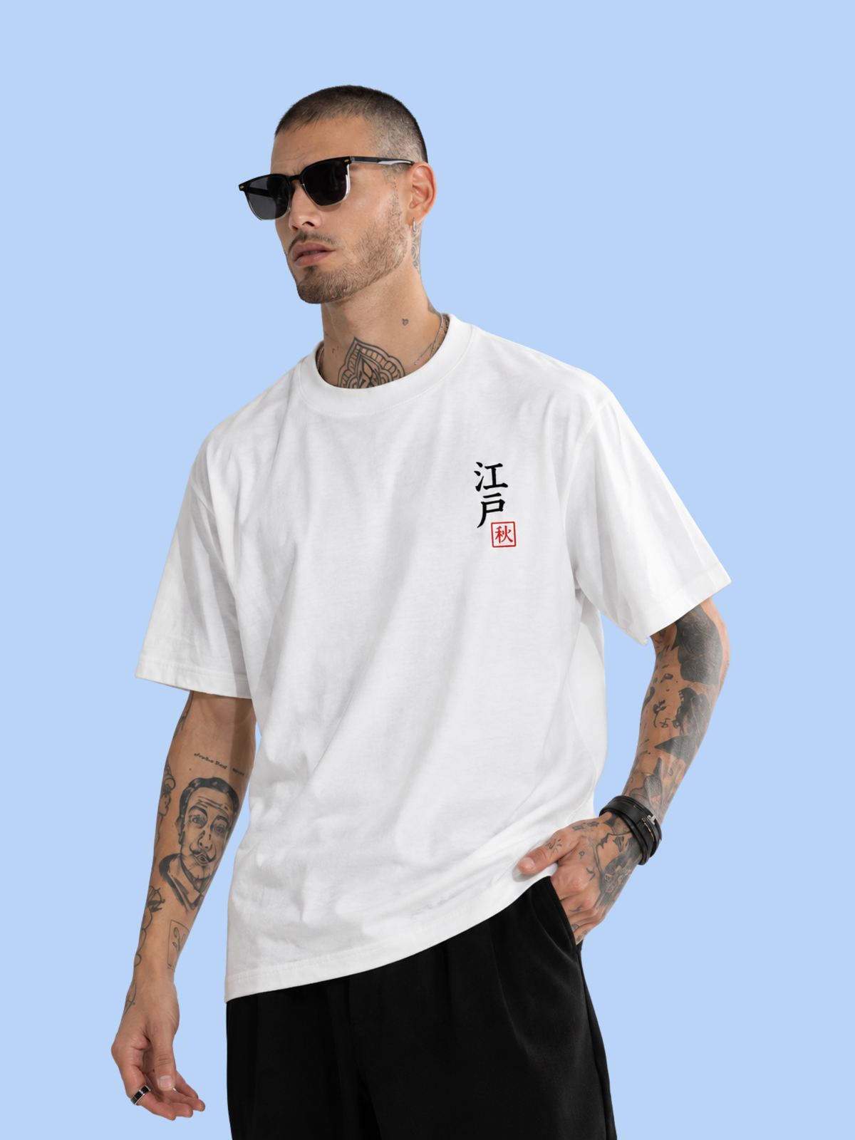 Model wearing the white Edo 春 Faint Bloom tee, front view with the 江戸 seal on the chest