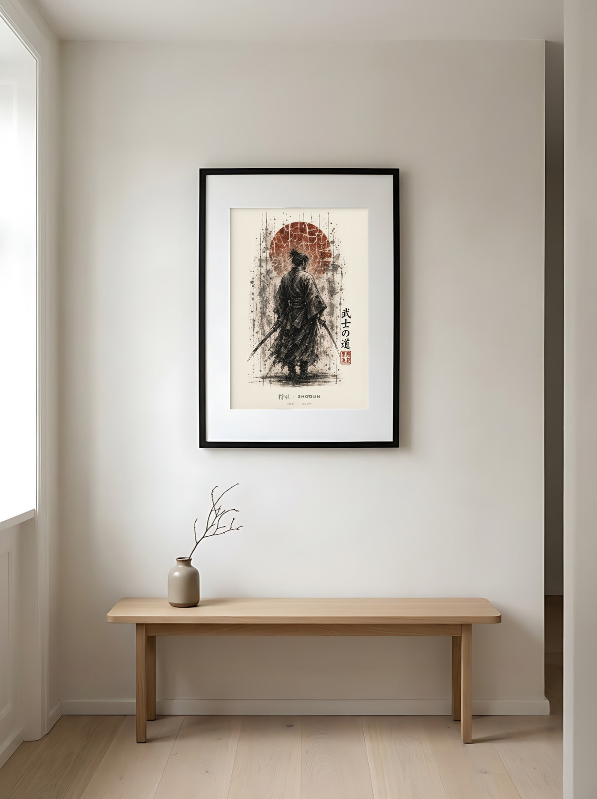 Edo Shōgun 将軍 framed print: a samurai commander in ink wash beneath a rust-red sun, black frame in a Japandi entryway above an oak bench