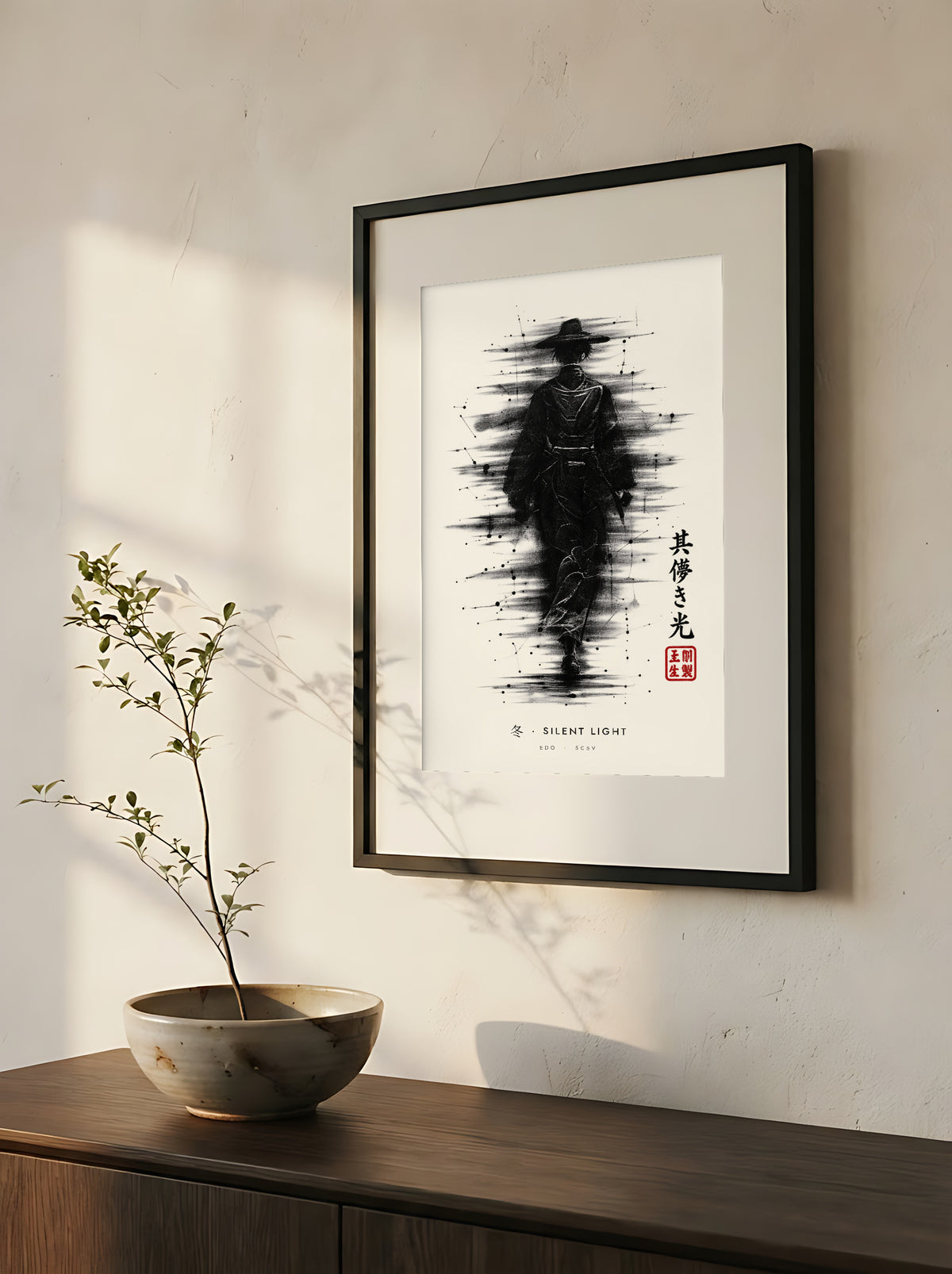 Edo Silent Light 冬 framed print: a lone traveller in a straw hat in heavy black ink, close-up of the black frame and white mat