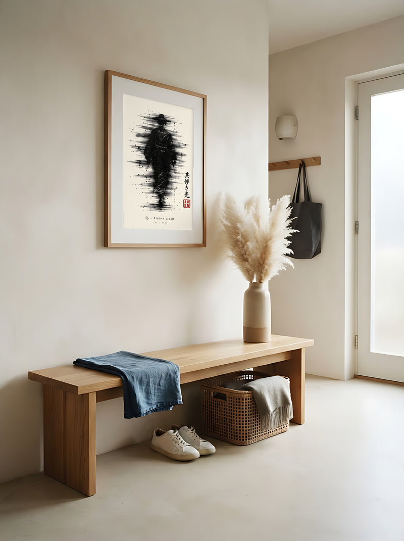 Edo Silent Light 冬 framed print: a lone traveller in a straw hat in heavy black ink, red oak frame in an entrance hall