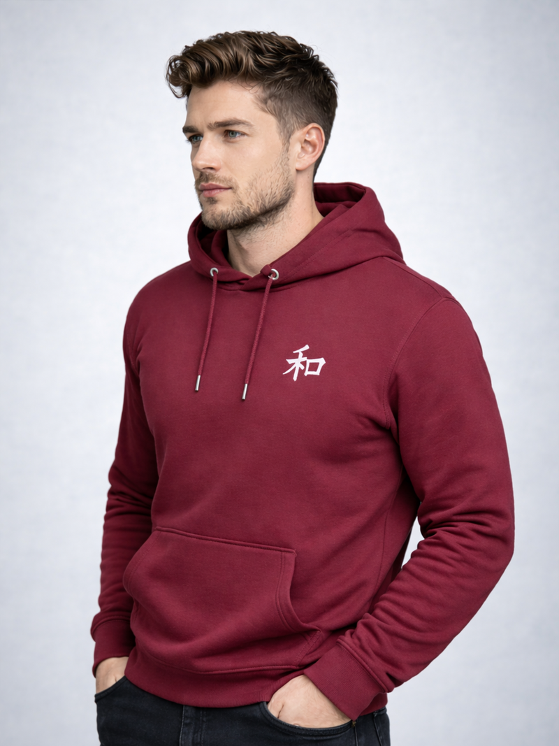 Model wearing the maroon Kyoto Harmony 和 hoodie, three-quarter view