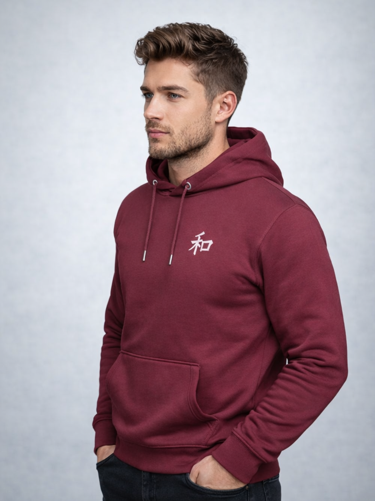 Model in the maroon Kyoto Harmony 和 hoodie, three-quarter front view