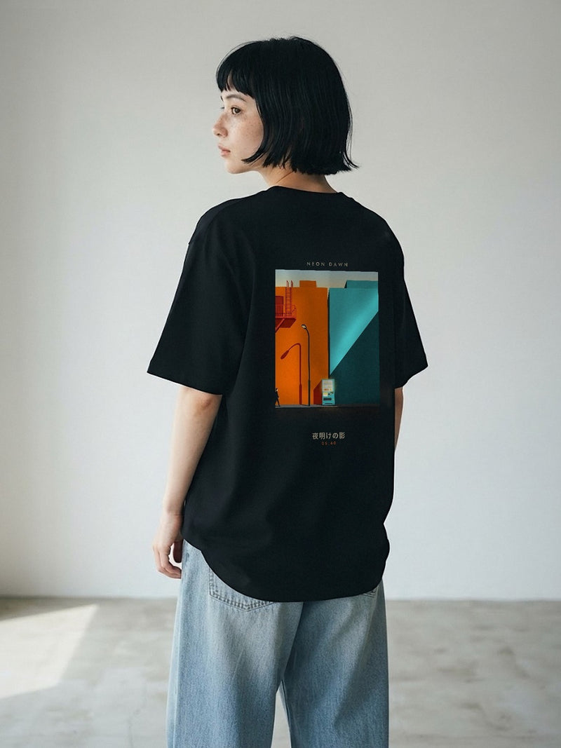 Model wearing the Neon Dawn Kage 影 black tee from behind, showing the orange and teal 05:40 Tokyo shadows back print