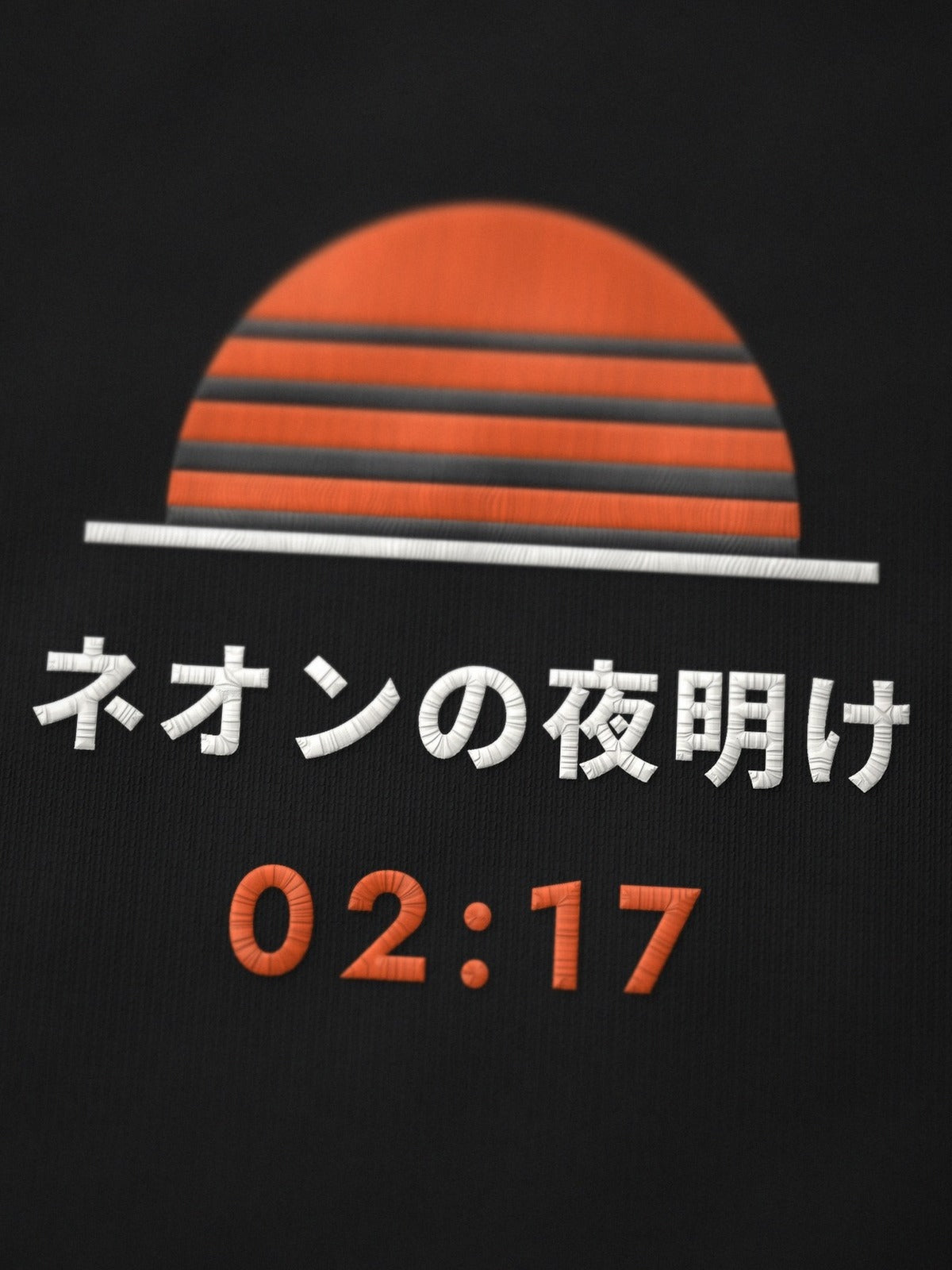 Close-up of the embroidered Neon Dawn chest emblem: orange striped sunrise, ネオンの夜明け in white thread and 02:17 in orange