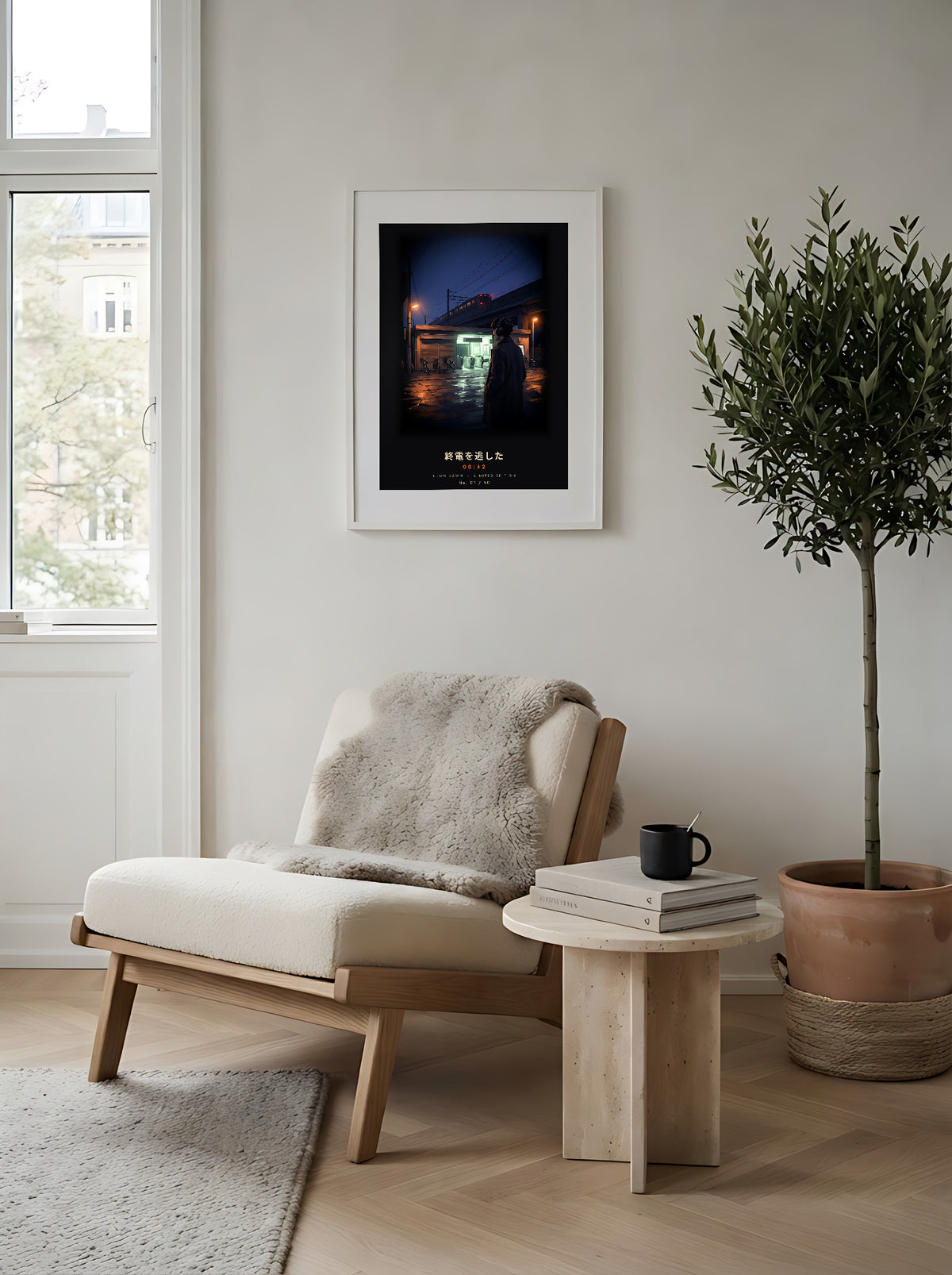 Shūden 終電 limited edition framed print: a young man in headphones outside a Tokyo station at midnight as the last train pulls away, white frame in a Scandi reading corner
