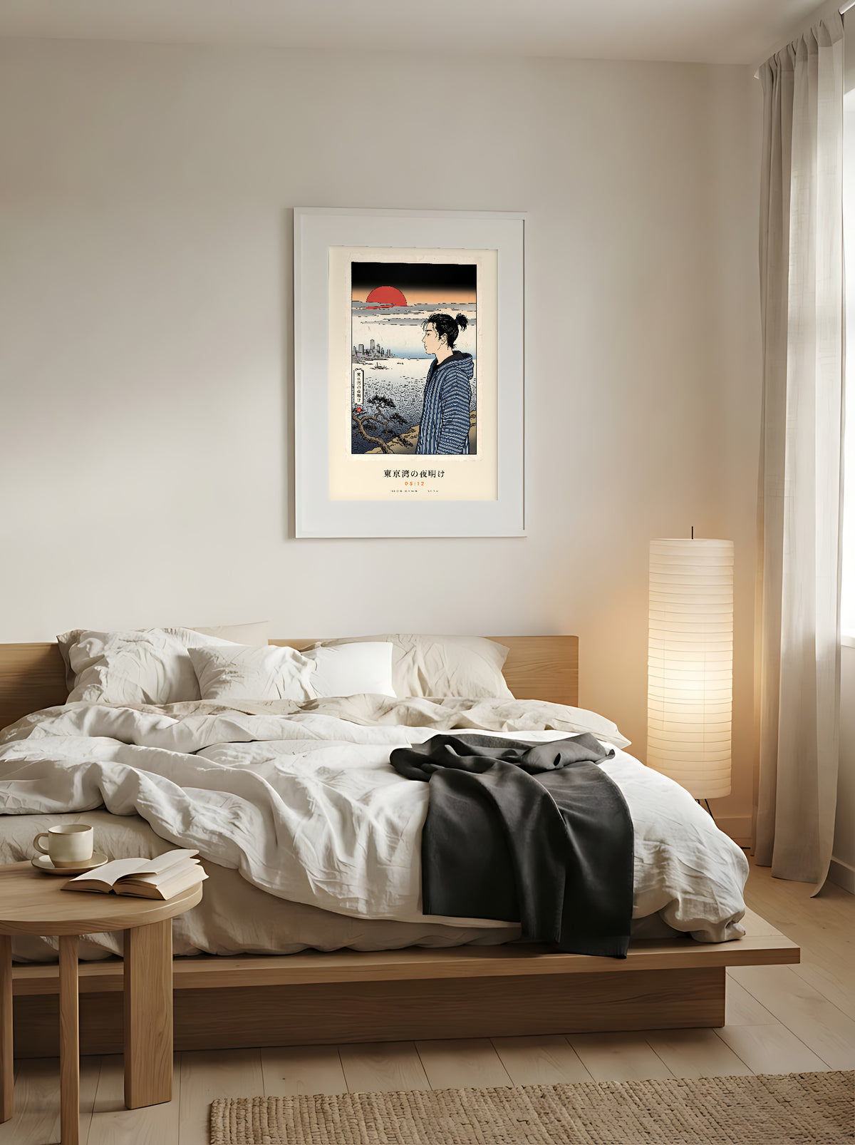 Tokyo Bay 東京湾 framed print: woodblock-style dawn over Tokyo Bay with a red sun, above a low oak bed in a Japandi bedroom