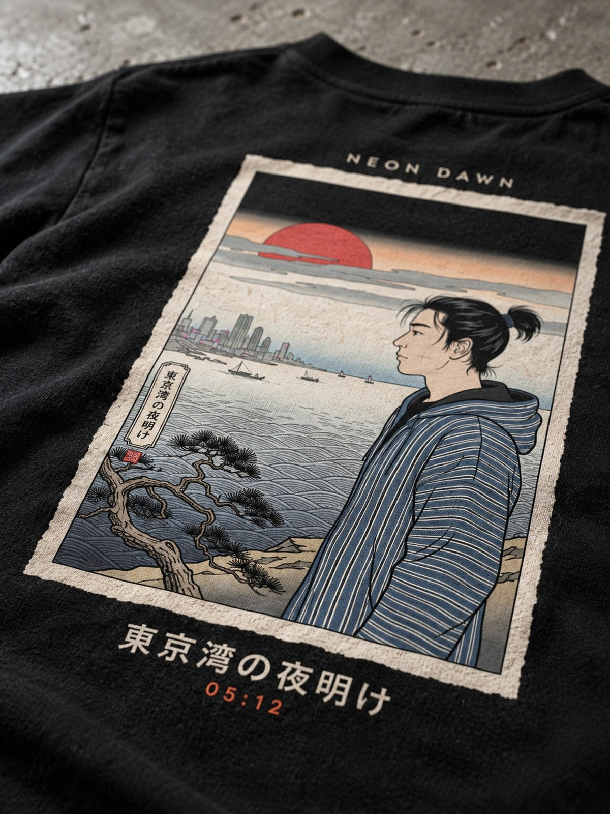 Detail of the Neon Dawn Tokyo Bay 東京湾 back print on heavyweight black cotton, the figure in the striped coat and the 東京湾の夜明け caption in focus