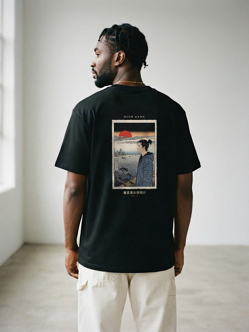 Model wearing the Neon Dawn Tokyo Bay 東京湾 black tee from behind, showing the Edo woodblock-style Tokyo Bay dawn back print