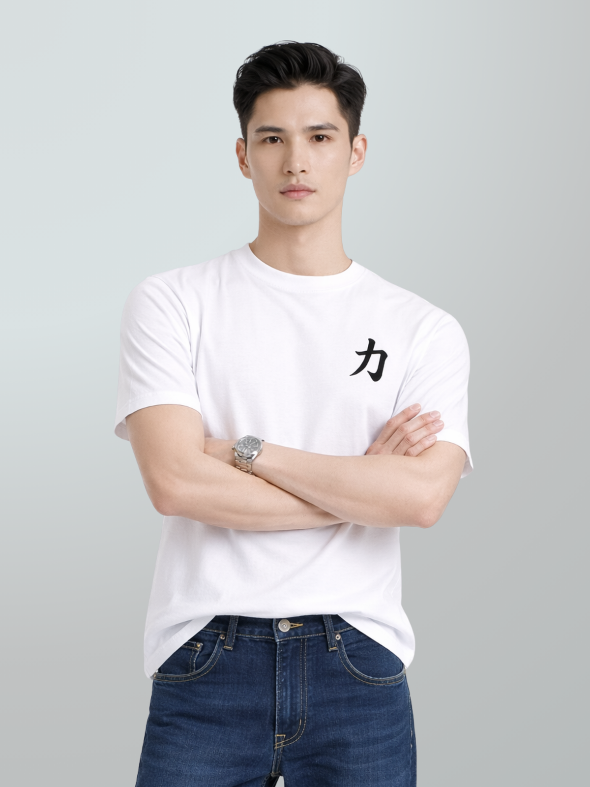 Model with arms crossed in the white Osaka Strength 力 premium oversized tee