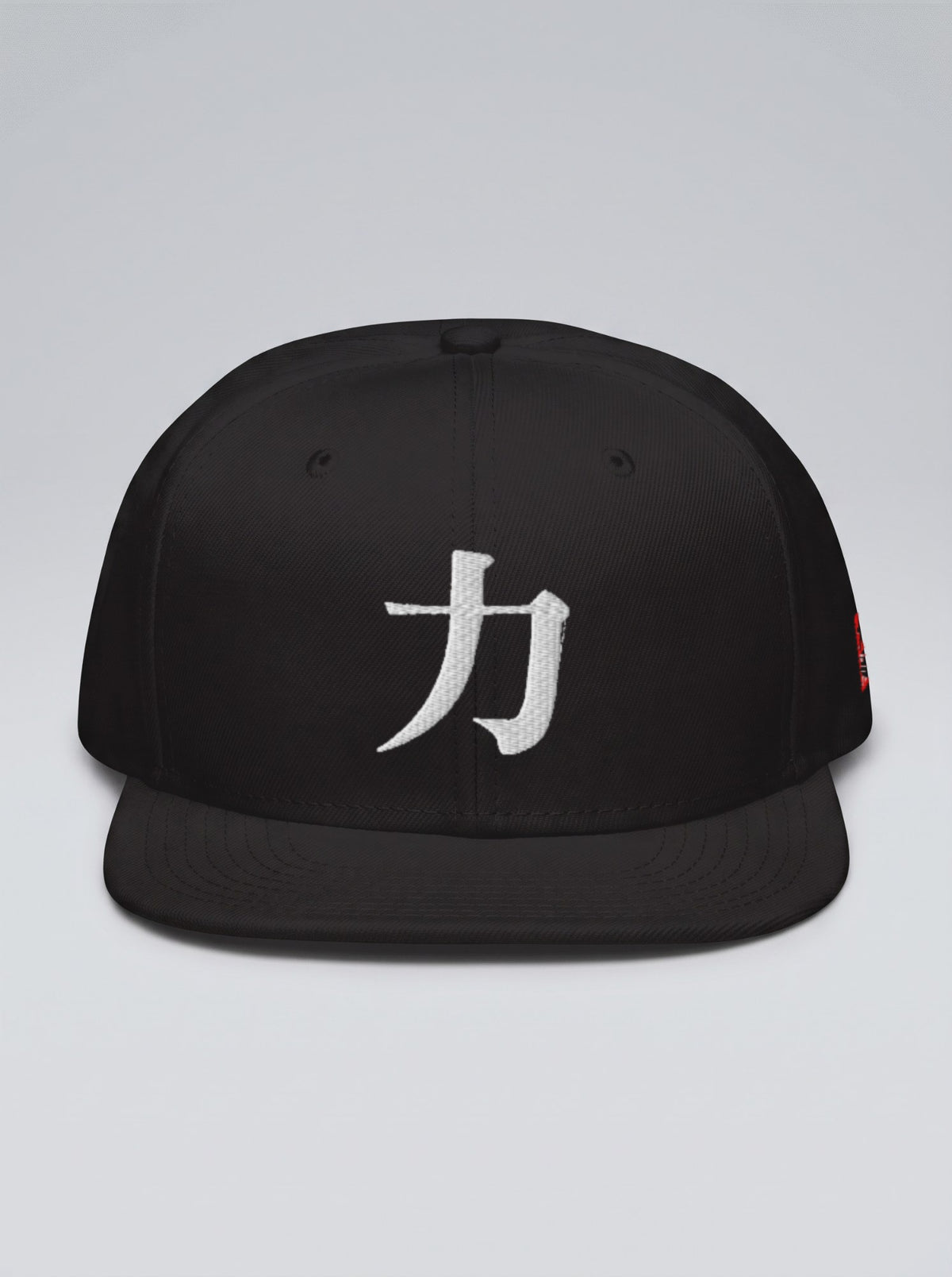 Osaka Chikara 力 Hanko Edition snapback in black, front view — white kanji embroidery on a grey studio backdrop