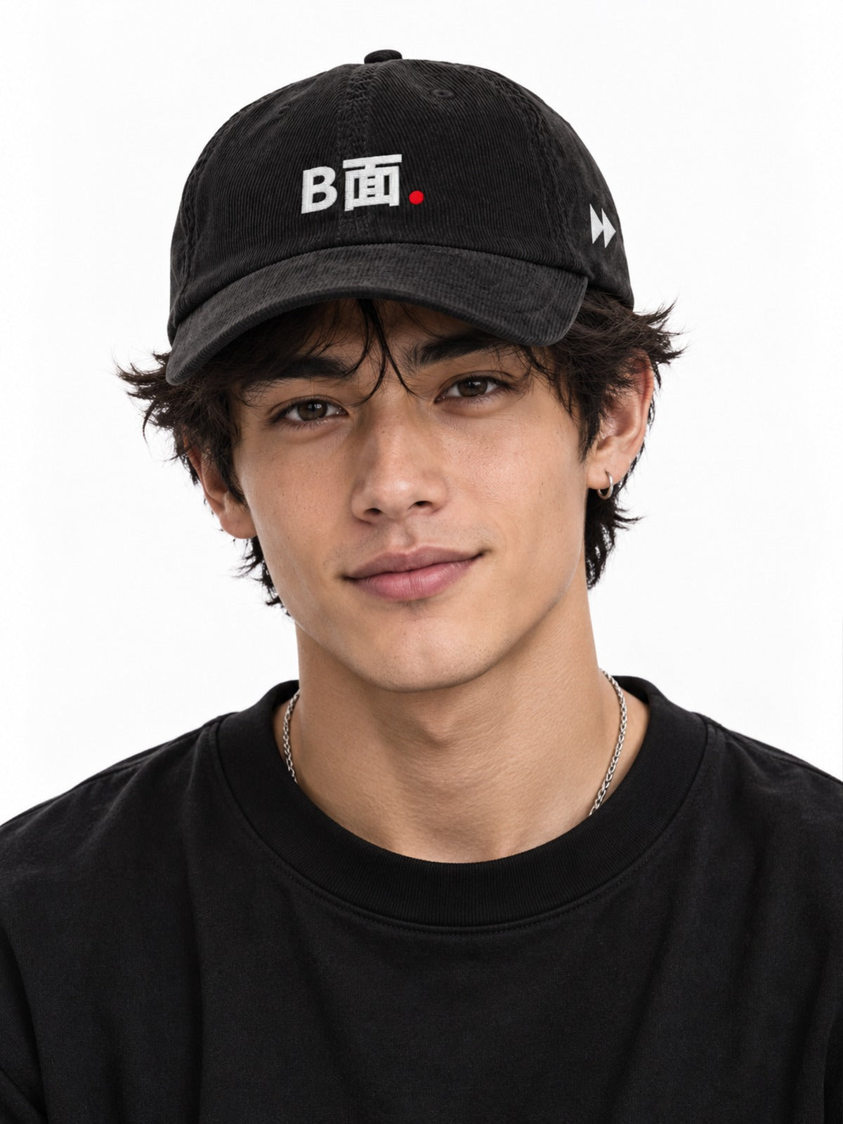 B面 Japanese Corduroy Baseball Cap in Black by 5C5V, on model, front view