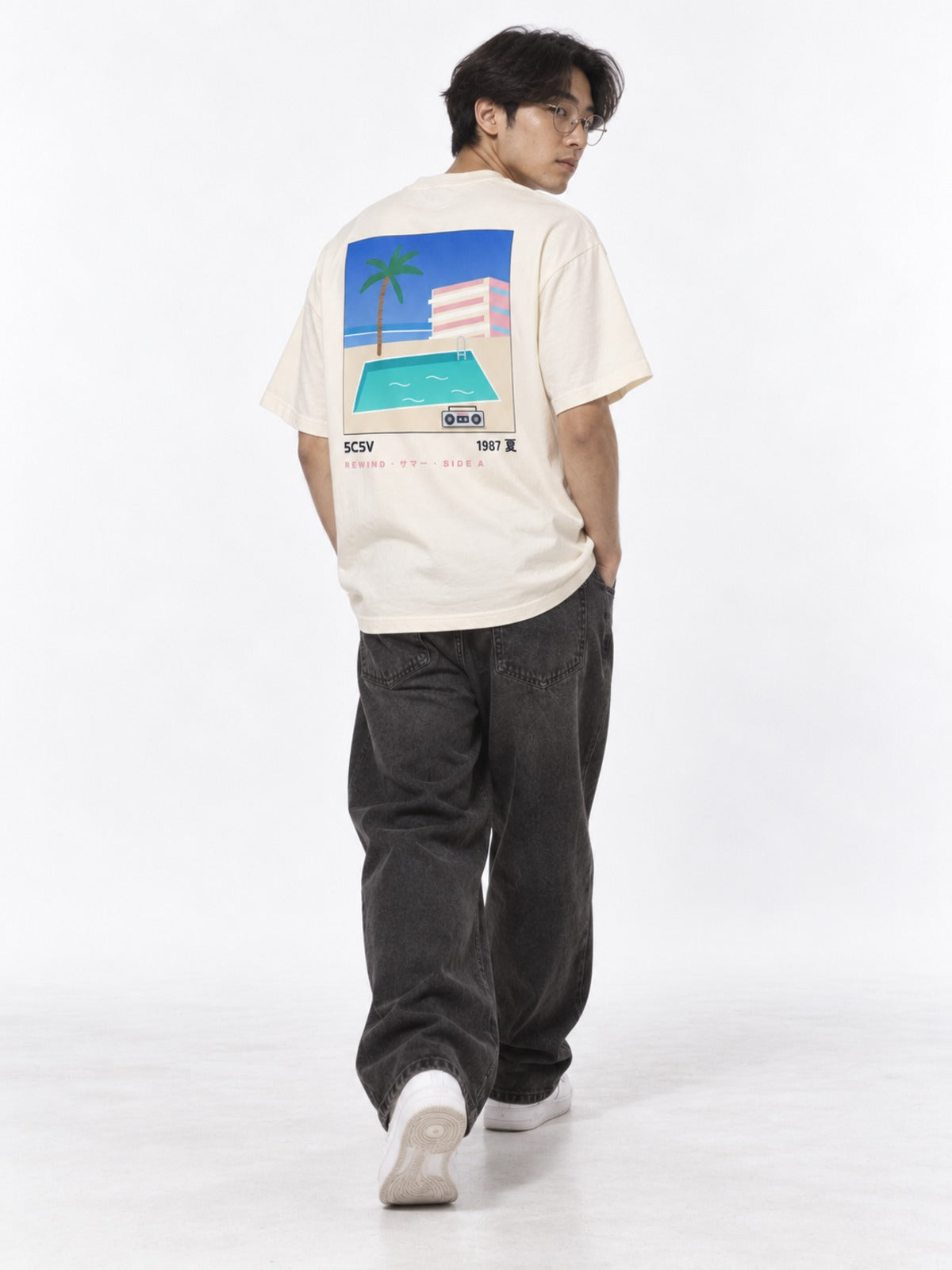 City Pop シティポップ 1987 Japanese Summer T-Shirt in vintage white by 5C5V, on model, full-length