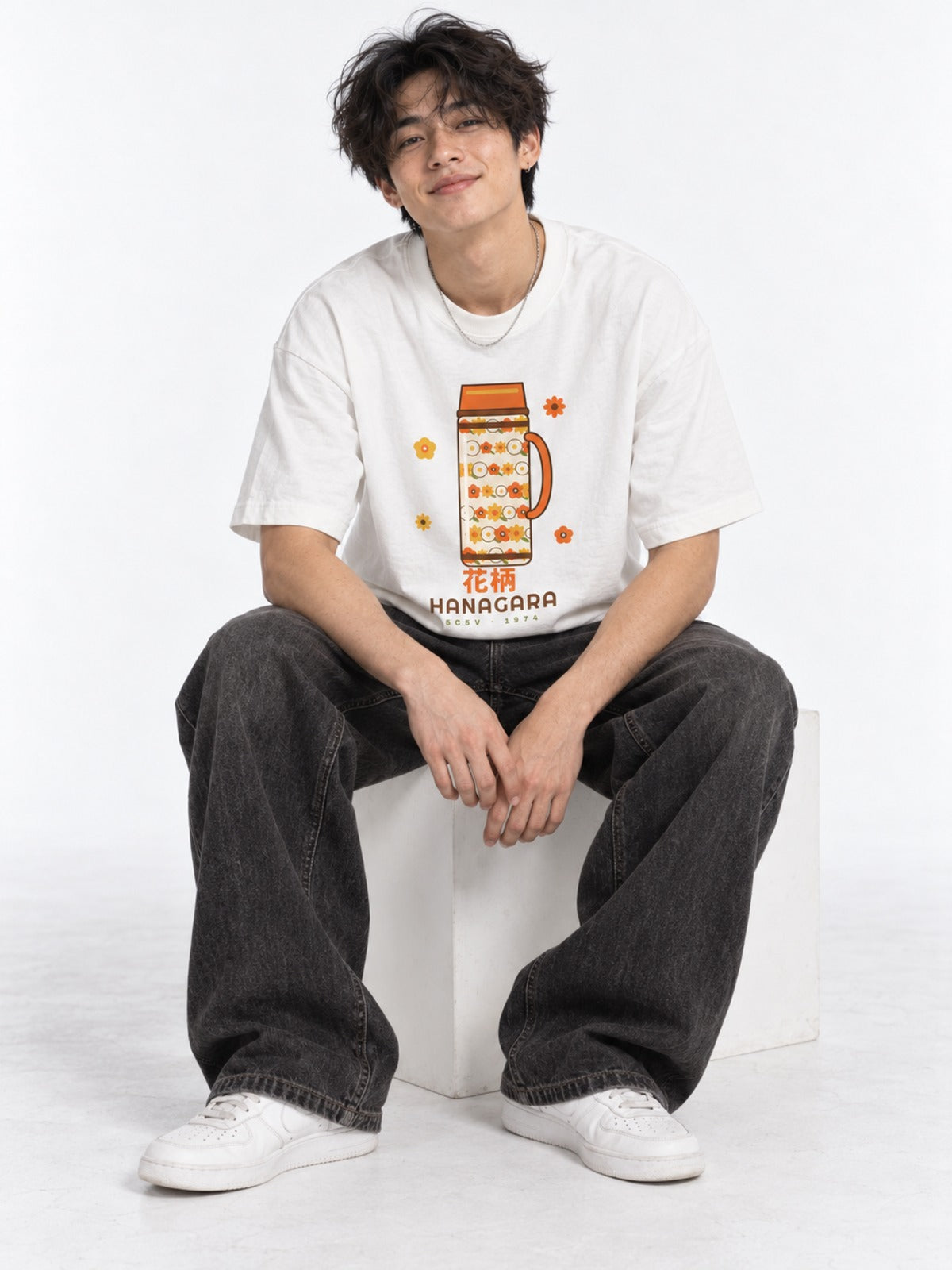 Hanagara 花柄 Japanese Flower Thermos T-Shirt in white by 5C5V, on model, seated