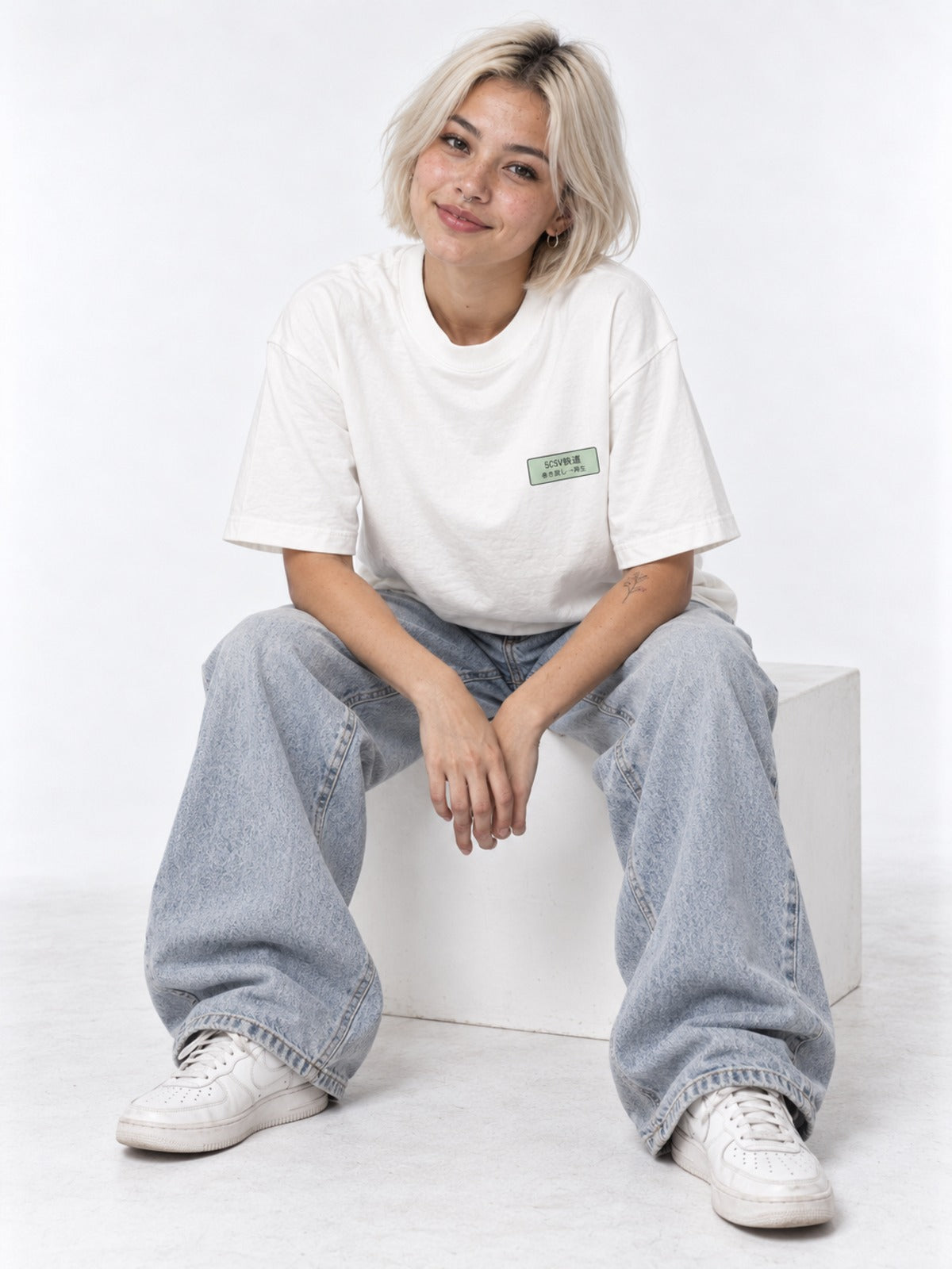 Kippu 切符 Japanese Train Ticket T-Shirt in white by 5C5V, on model, seated