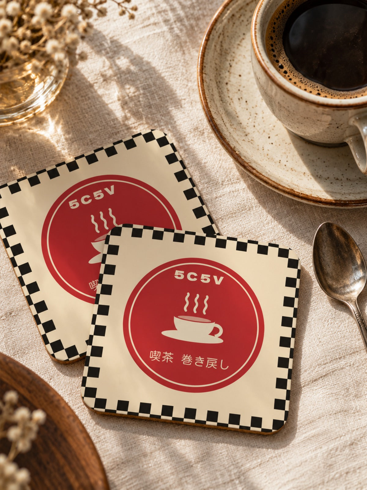 Two Kissaten 喫茶 Japanese Coffee Coasters by 5C5V on linen with a coffee cup