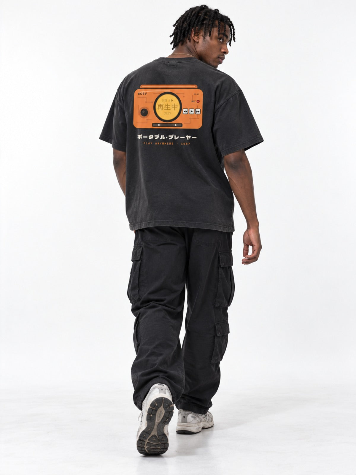 Saisei-chū 再生中 Japanese Cassette Player T-Shirt in faded vintage black by 5C5V, on model, full-length