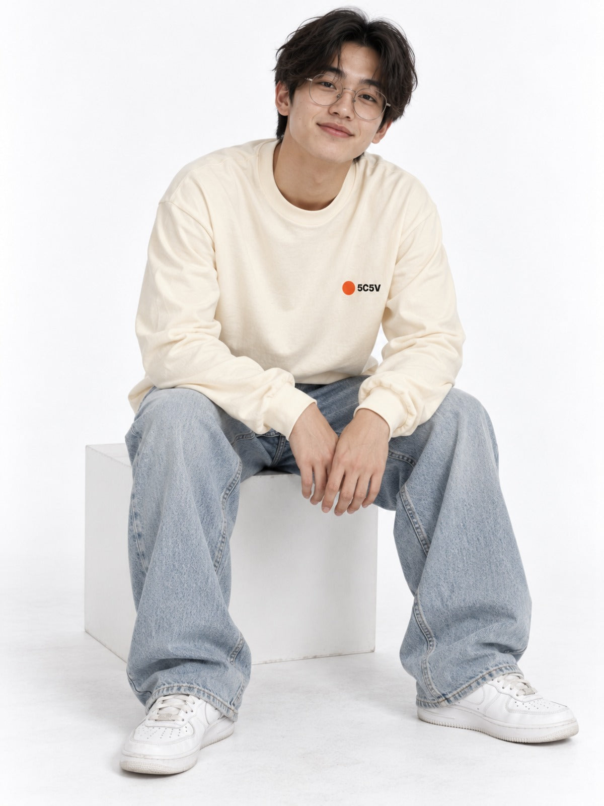 Shibuya-kei 渋谷系 Side A Japanese Long Sleeve T-Shirt in ecru by 5C5V, on model, seated