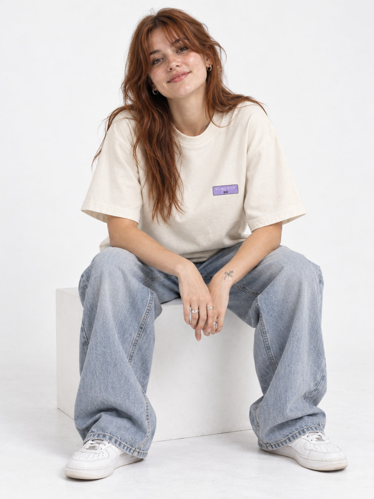Terehon Kādo テレホンカード Japanese Phone Card T-Shirt in vintage white by 5C5V, on model, seated