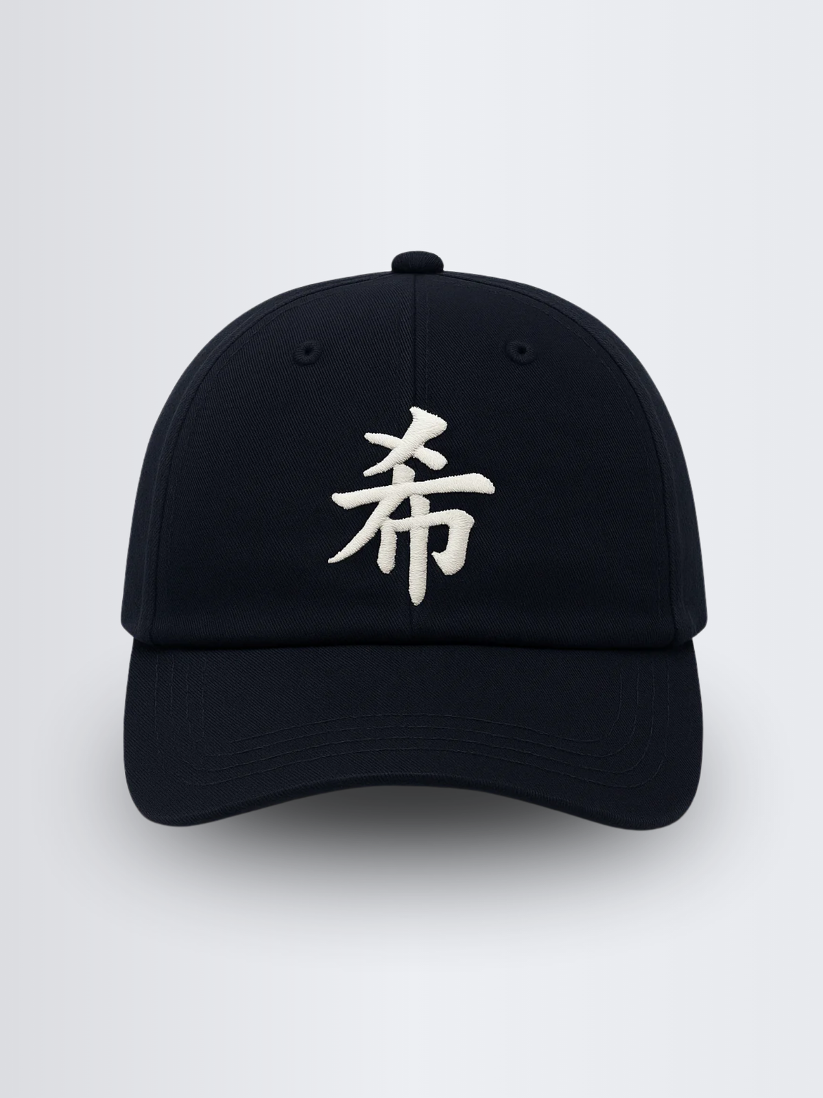 Navy Sapporo Hope 希 cap, front view with the white 希 embroidery