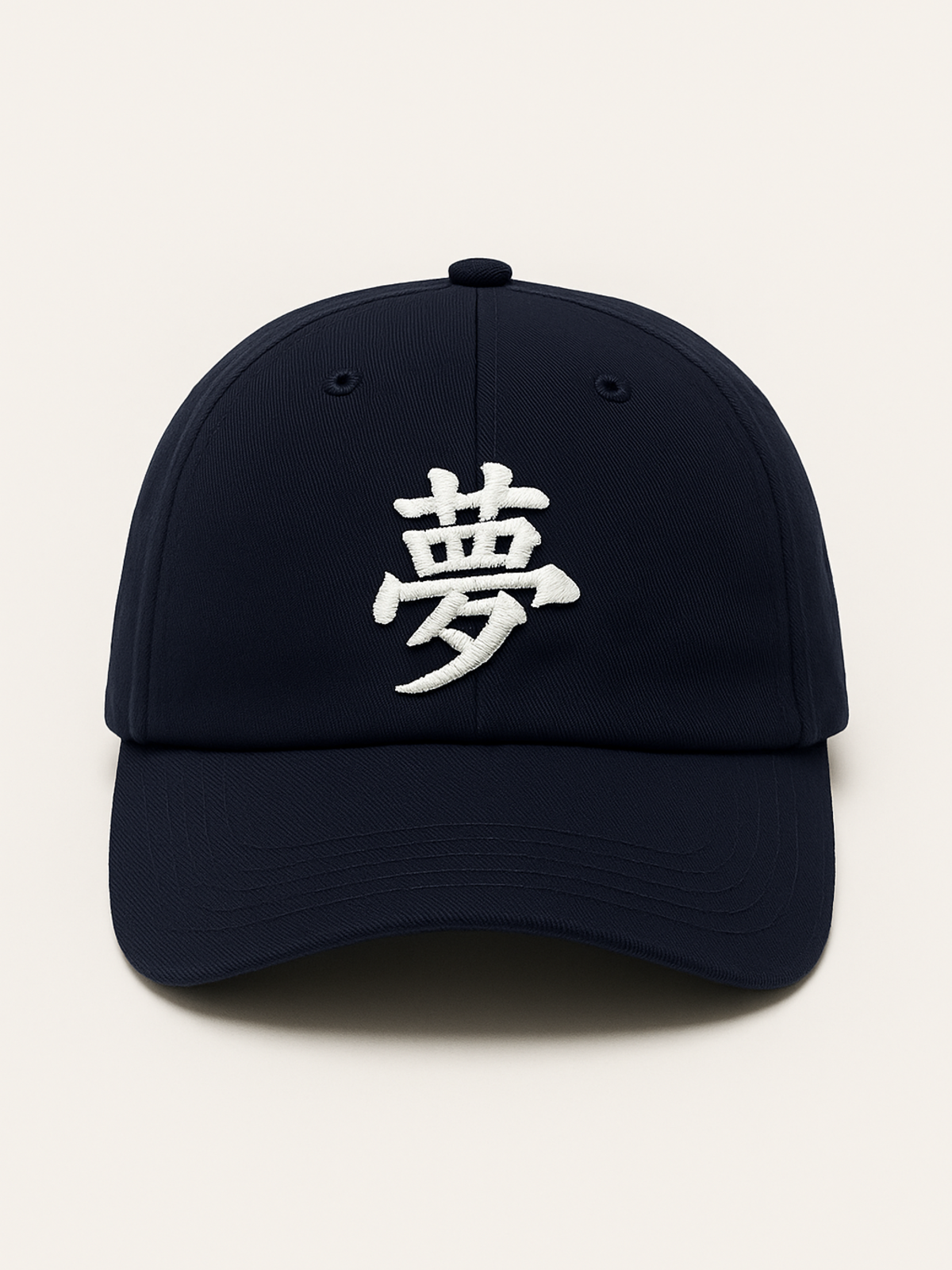 Navy Tokyo Dream 夢 cap, front view with the white 夢 embroidery