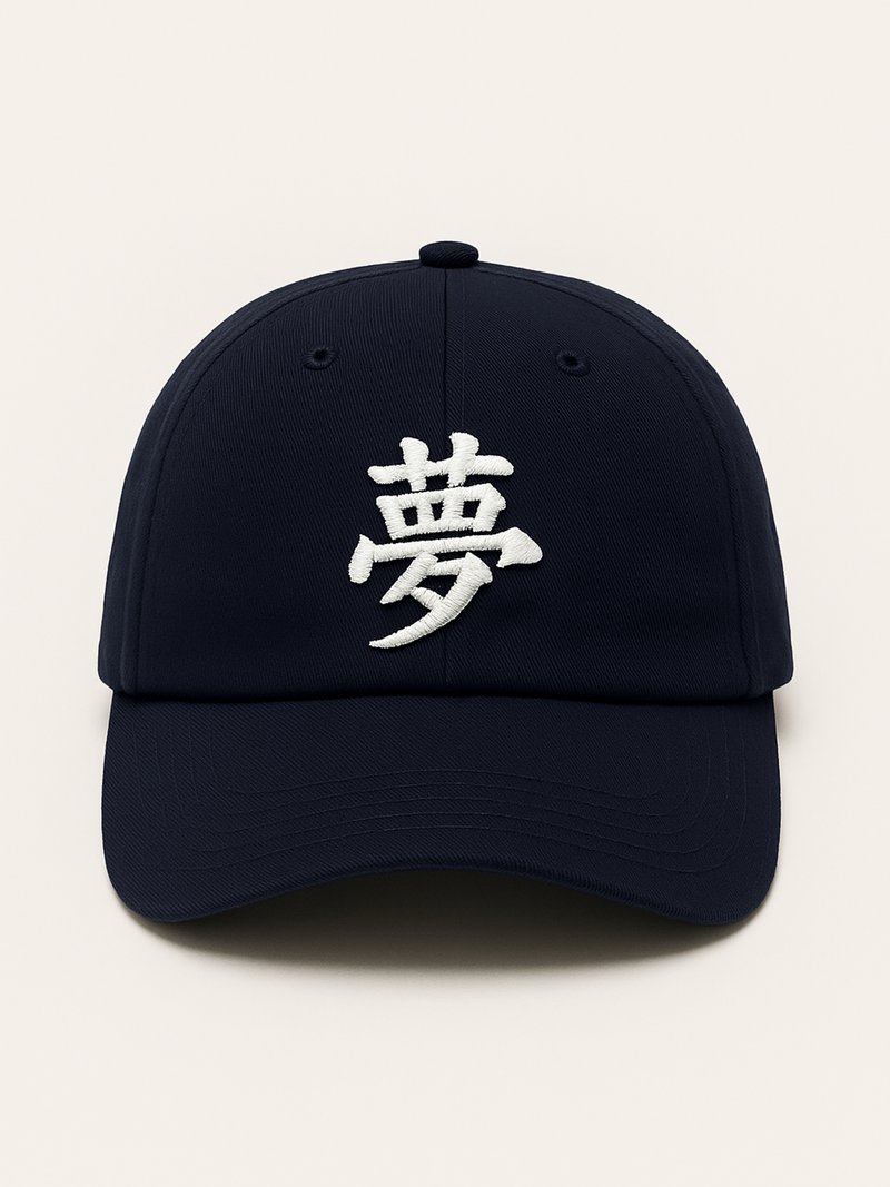 Navy Tokyo Dream 夢 cap, front view with the white 夢 embroidery